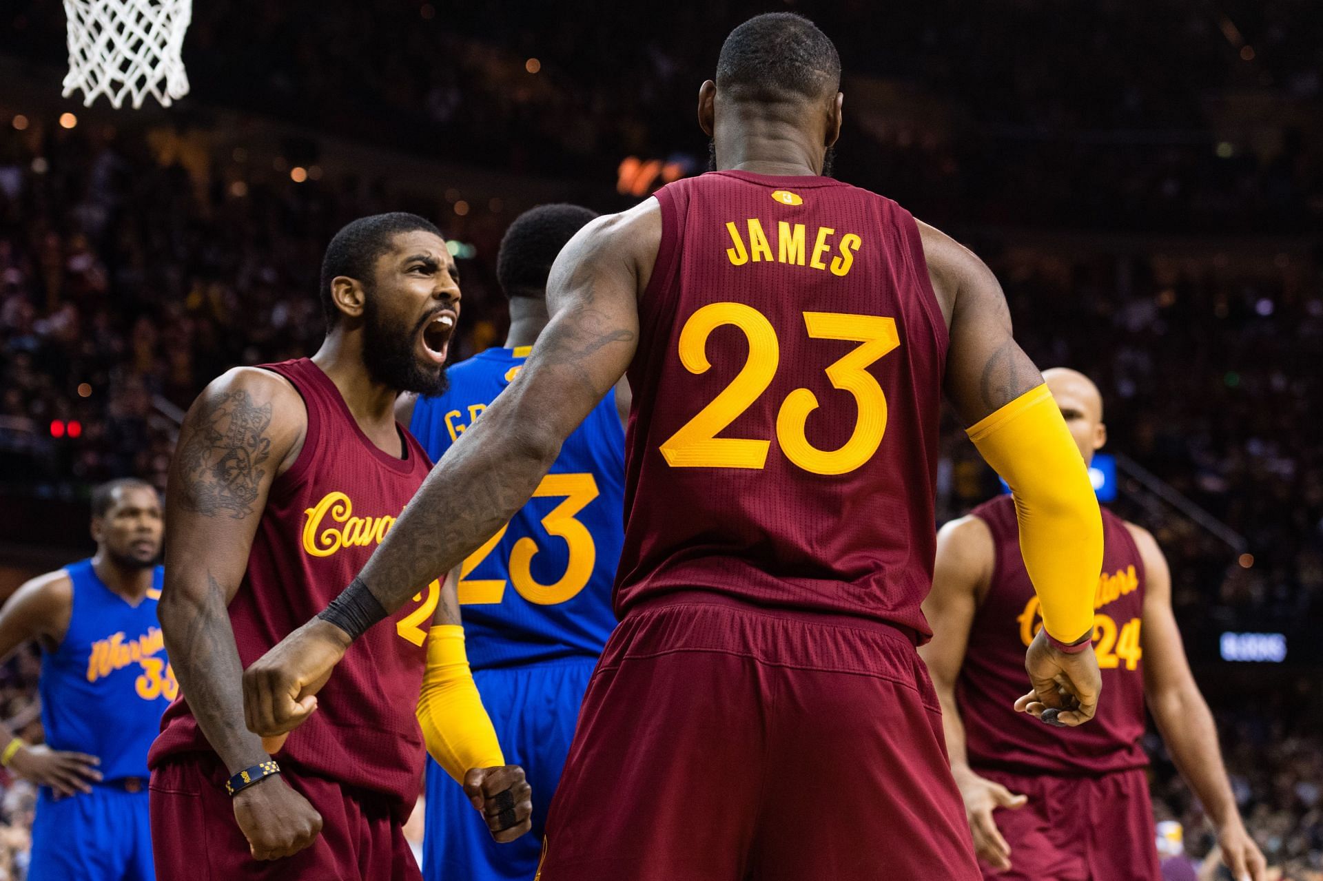 Kyrie Irving #2 and LeBron James #23 of the Cleveland Cavaliers celebrate after James scored during the second half against the Golden State Warriors at Quicken Loans Arena on December 25, 2016 in Cleveland, Ohio. The Cavaliers defeated the Warriors 109-108.