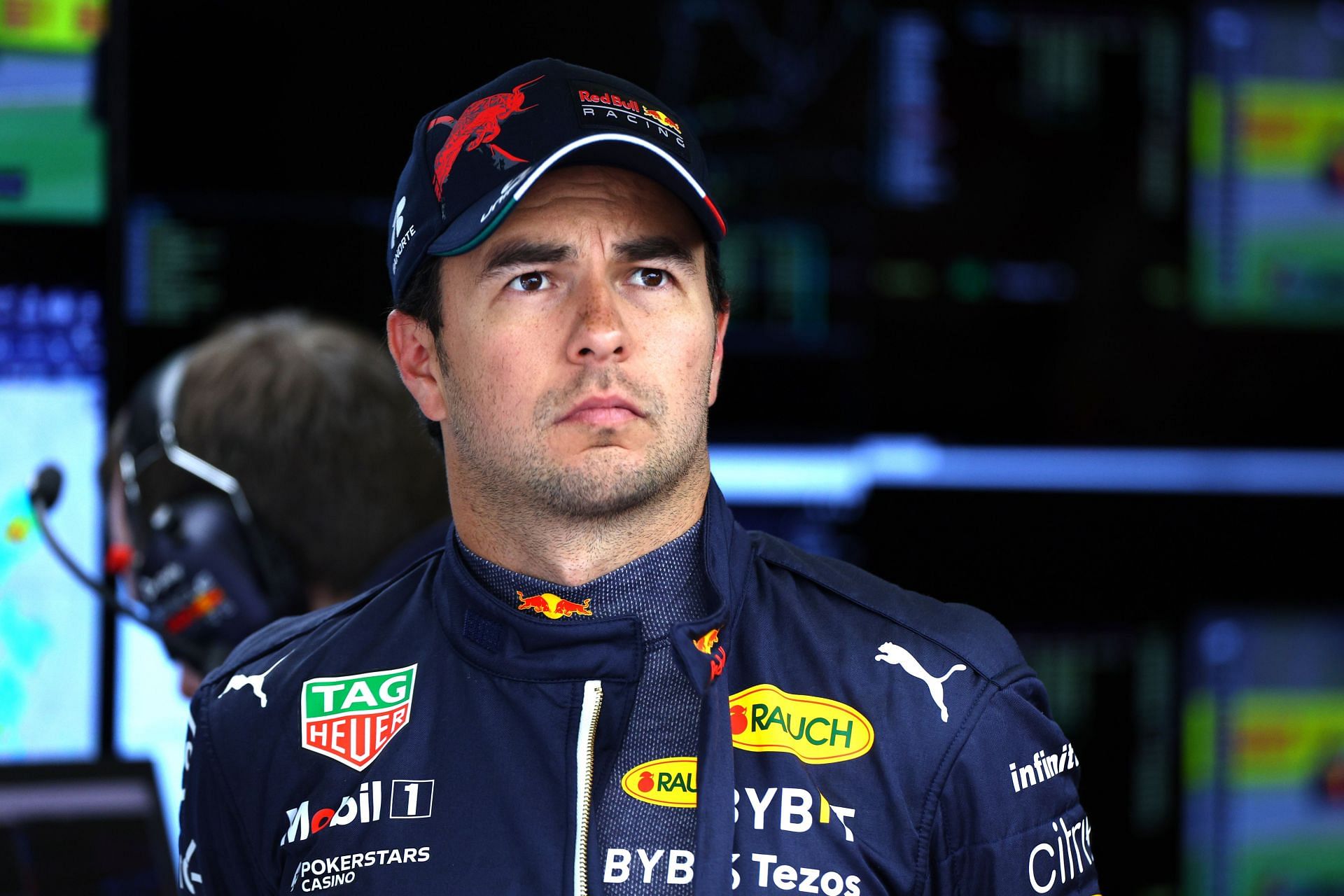 Sergio Perez looks on inside the garage during practice ahead of the F1 Grand Prix of Great Britain at Silverstone on July 01, 2022 in Northampton, England. (Photo by Clive Rose/Getty Images)