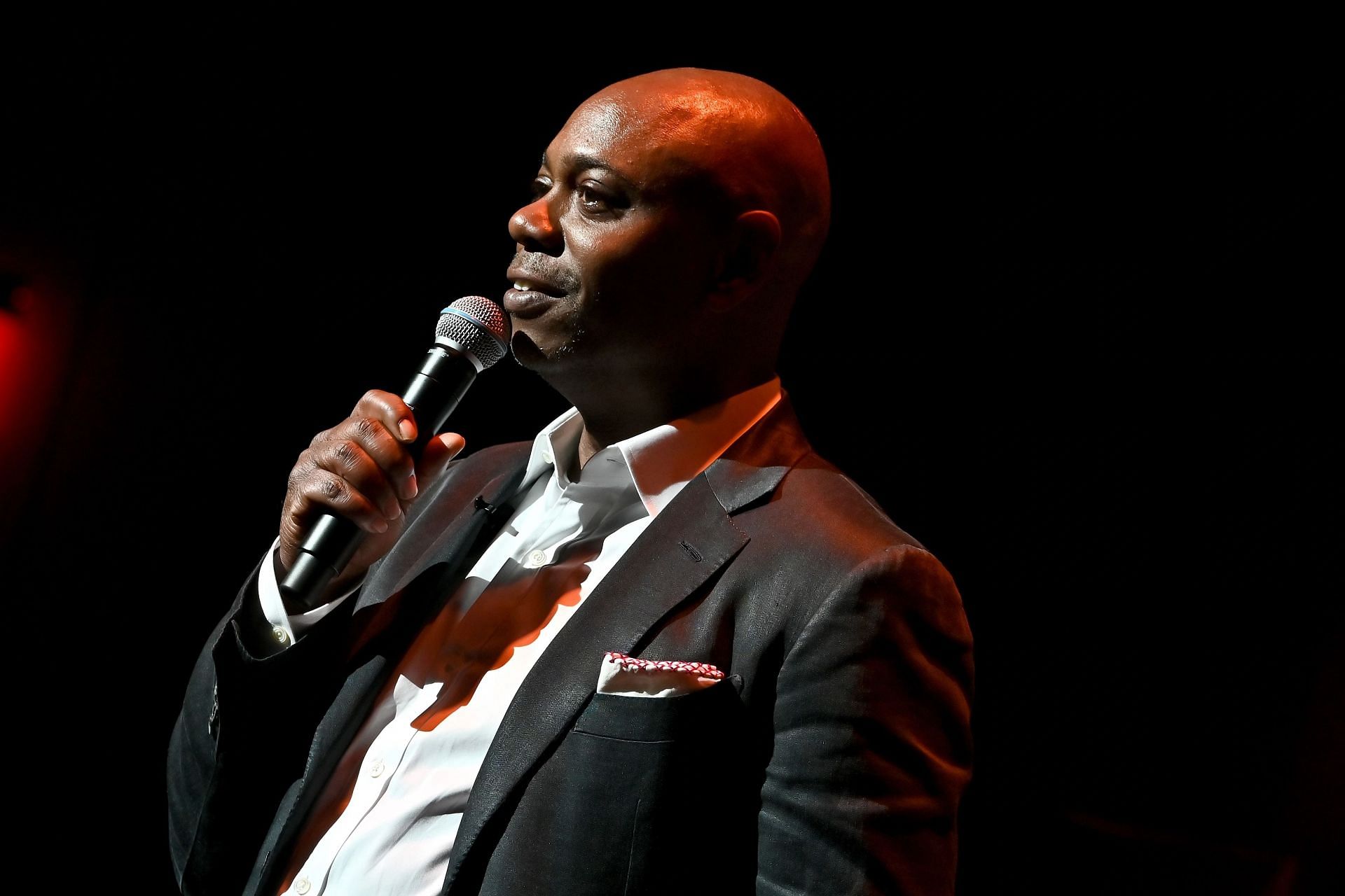 Chappelle during his performance in 2022 (Image via Shannon Finney/Getty Images)