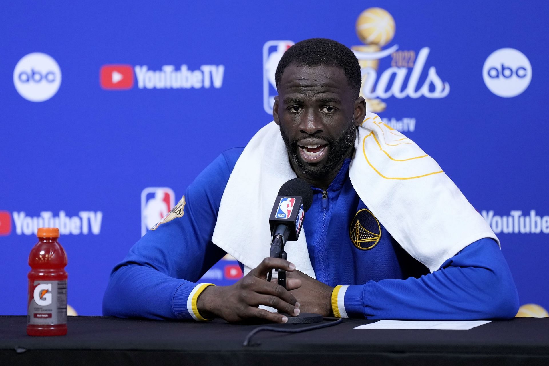 Draymond Green of the Golden State Warriors talks with media