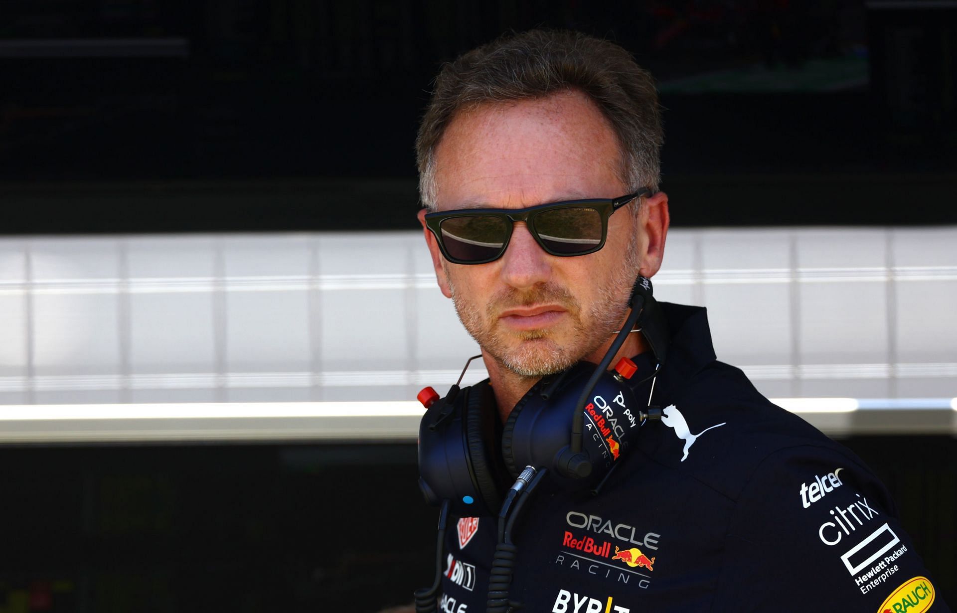 Red Bull team principal Christian Horner looks on from the paddock during the 2022 F1 French GP weekend. (Photo by Mark Thompson/Getty Images)