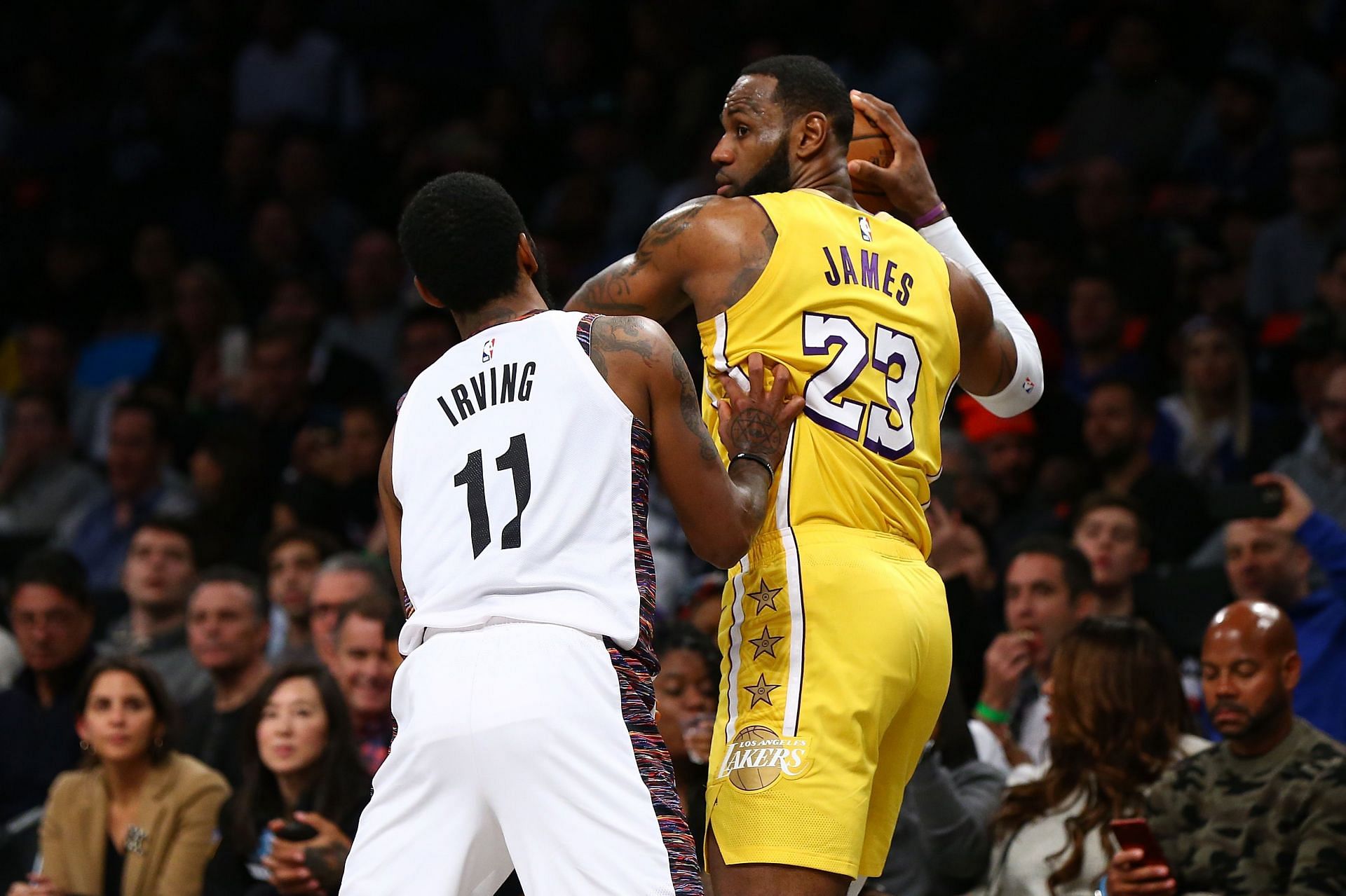 Kyrie Irving of the Brooklyn Nets and LeBron James of the LA Lakers