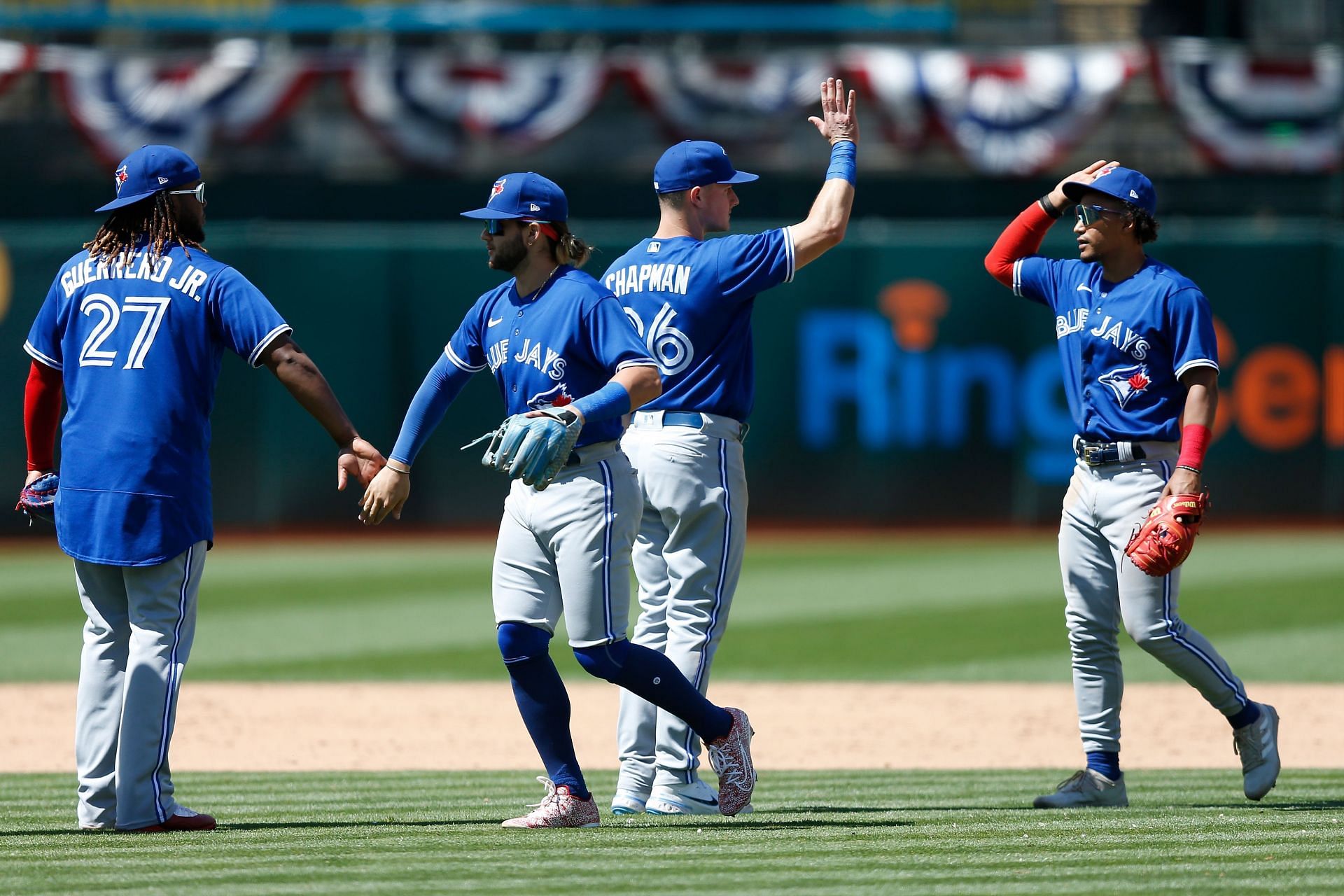 Blue Jays players celebrate the win.