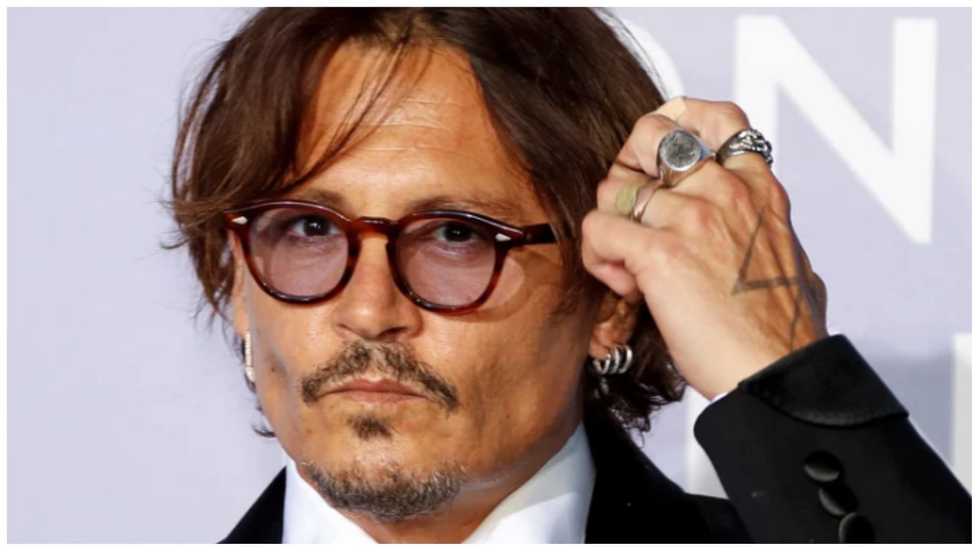 The Johnny Depp Shot can be ordered by men who feel unsafe in the bar (image via EPA/Eric Gaillard)