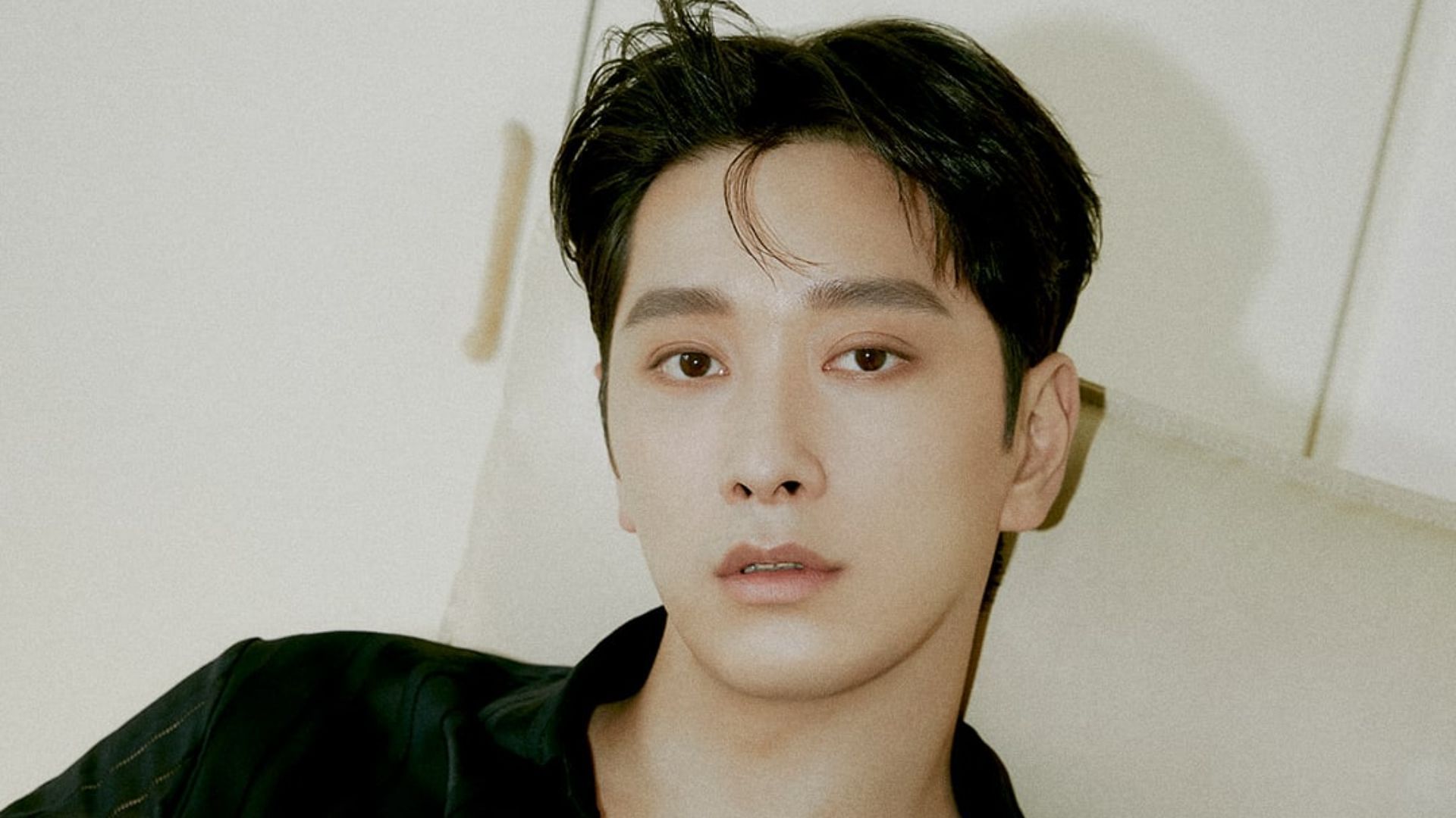Chansung posing for the concept photo of MUST (Image via JYP Entertainment)