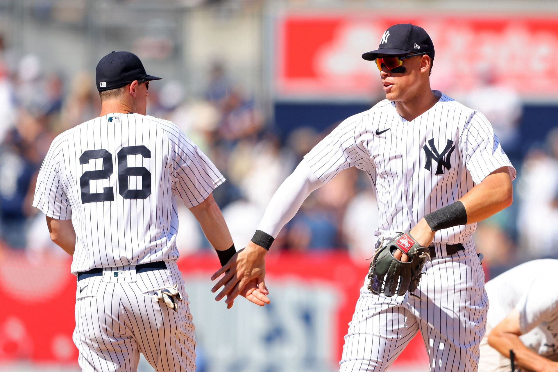 Birthday boy LeMahieu scores in 10th, Yanks beat Reds 7-6