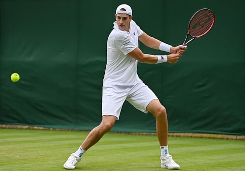 John Isner in action at Wimbledon