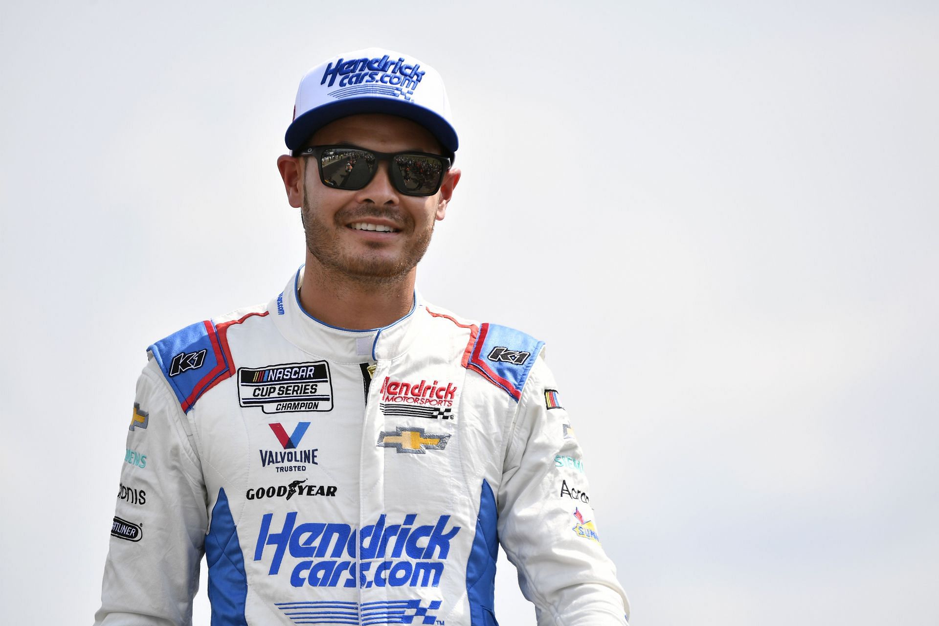 Kyle Larson walks onstage during driver intros before the 2022 NASCAR Cup Series Ally 400 at Nashville Superspeedway in Lebanon, Tennessee (Photo by Logan Riely/Getty Images)