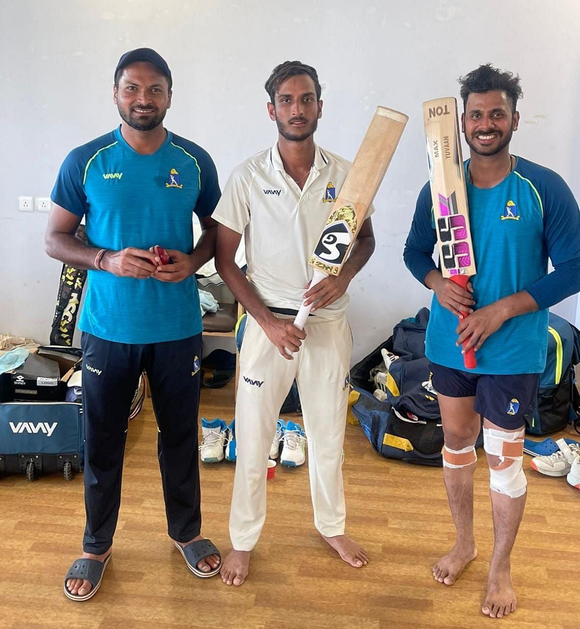 Manoj Tiwary (right) and Shahbaz Ahamad (centre) pose after their hundreds in the semifinal [Credits: CAB]