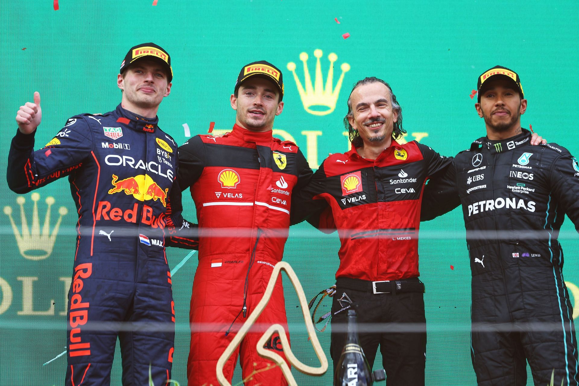 From L to R: Red Bull&#039;s Max Verstappen, Ferrari&#039;s Charles Leclerc and Laurent Mekies, and Mercedes&#039; Lewis Hamilton on the podium at the 2022 F1 Austrian GP (Photo by Clive Rose/Getty Images)
