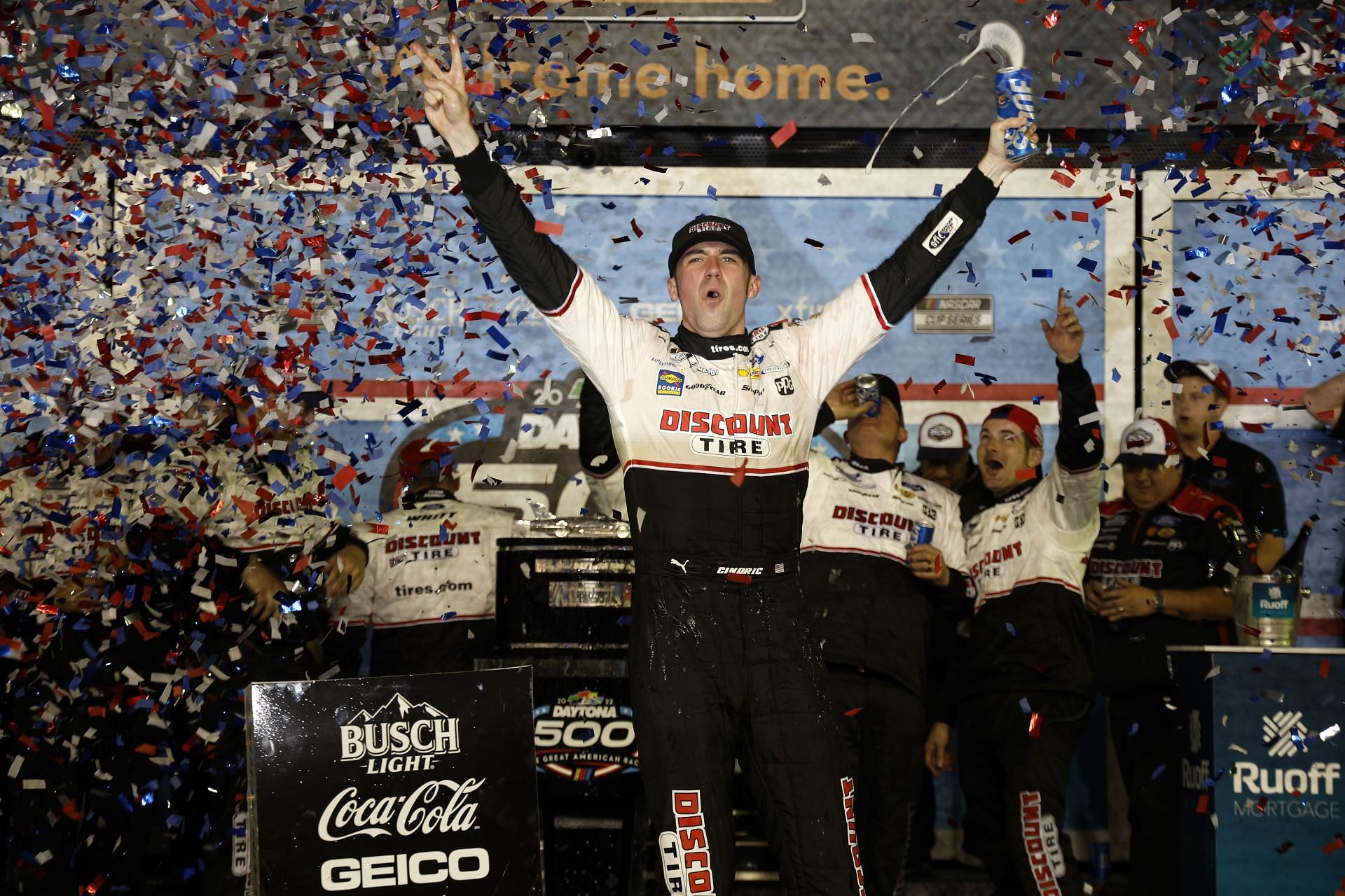 Austin Cindric celebrates in the Ruoff Mortgage victory lane after winning the 2022 NASCAR Cup Series 64th Annual Daytona 500 at Daytona International Speedway in Florida (Photo by Chris Graythen/Getty Images)