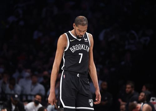 Kevin Durant #7 of the Brooklyn Nets looks on against the Boston Celtics during Game Three of the Eastern Conference First Round NBA Playoffs at Barclays Center on April 23, 2022 in New York City.