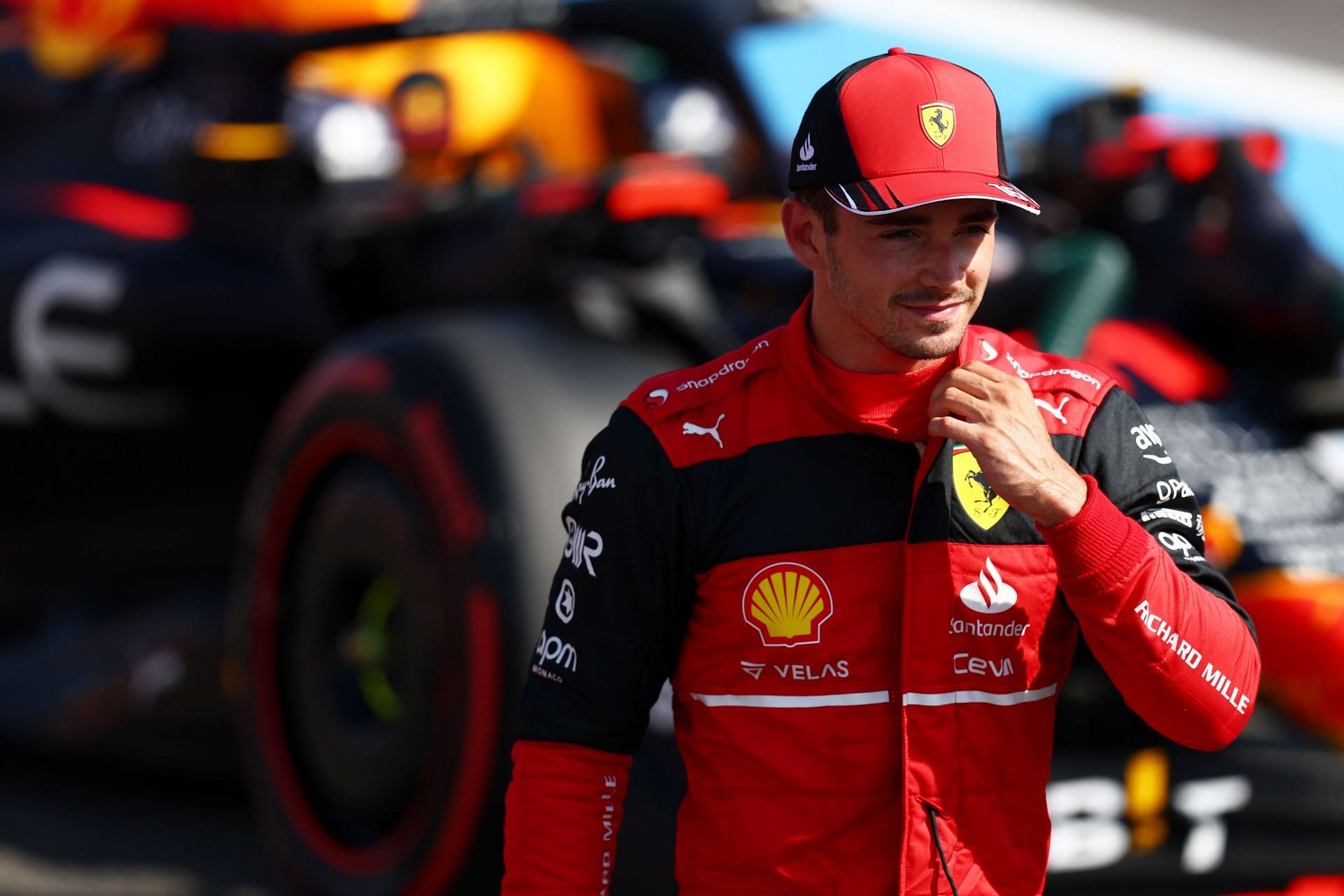 Pole position qualifier Charles Leclerc celebrates in parc ferme during qualifying ahead of the F1 Grand Prix of France at Circuit Paul Ricard on July 23, 2022, in Le Castellet, France (Photo by Clive Rose/Getty Images)