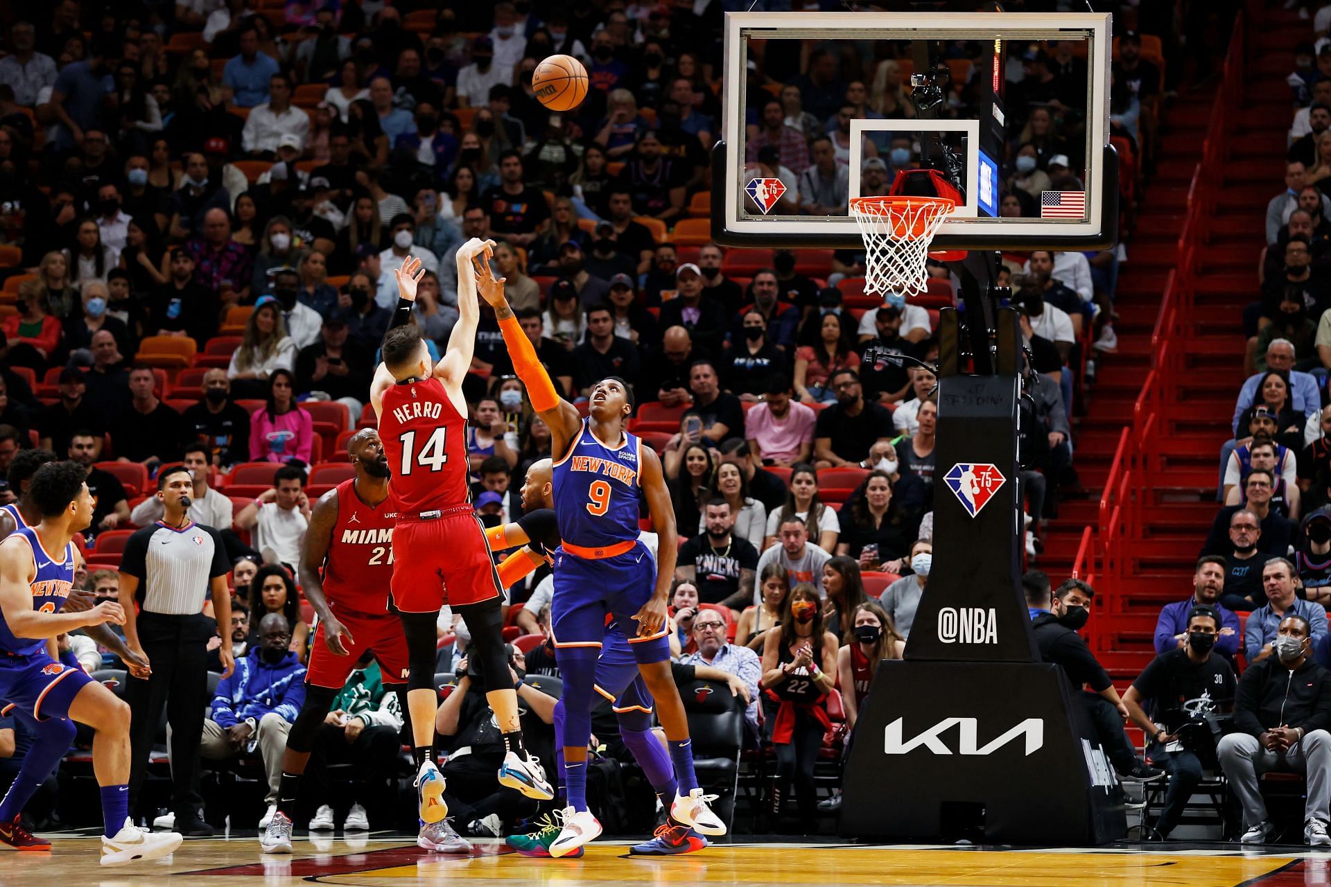 Tyler Herro (left) shoots over RJ Barrett during a game between the New York Knicks and the Miami Heat
