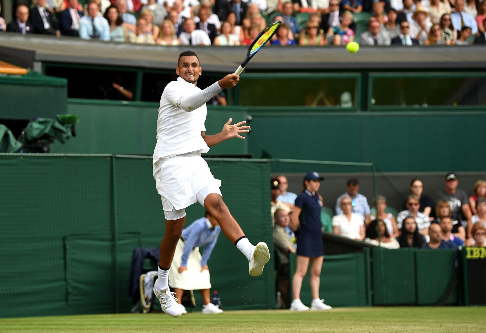 Nick Kyrgios in action against Rafael Nadal at Wimbledon 2019