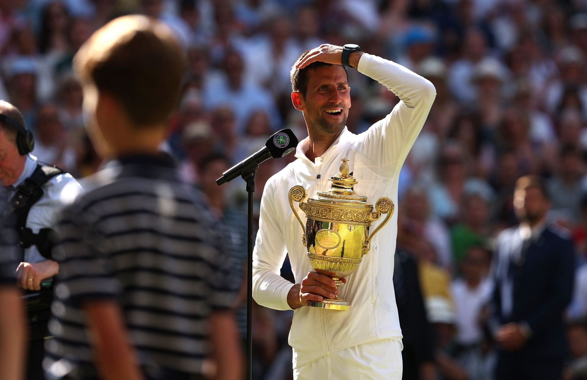 Novak Djokovic with the 2022 Wimbledon men&#039;s singles trophy