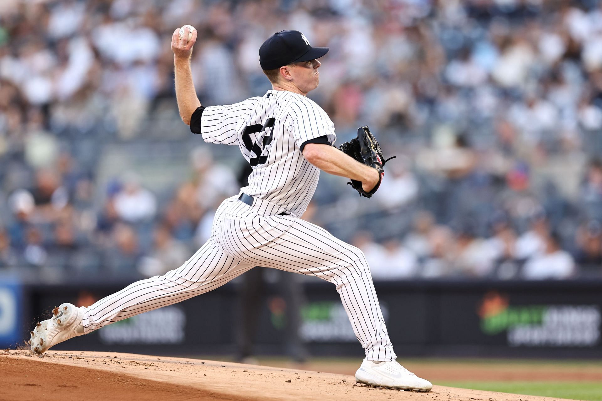 JP Sears of the New York Yankees throws a pitch against the Oakland Athletics at Yankee Stadium