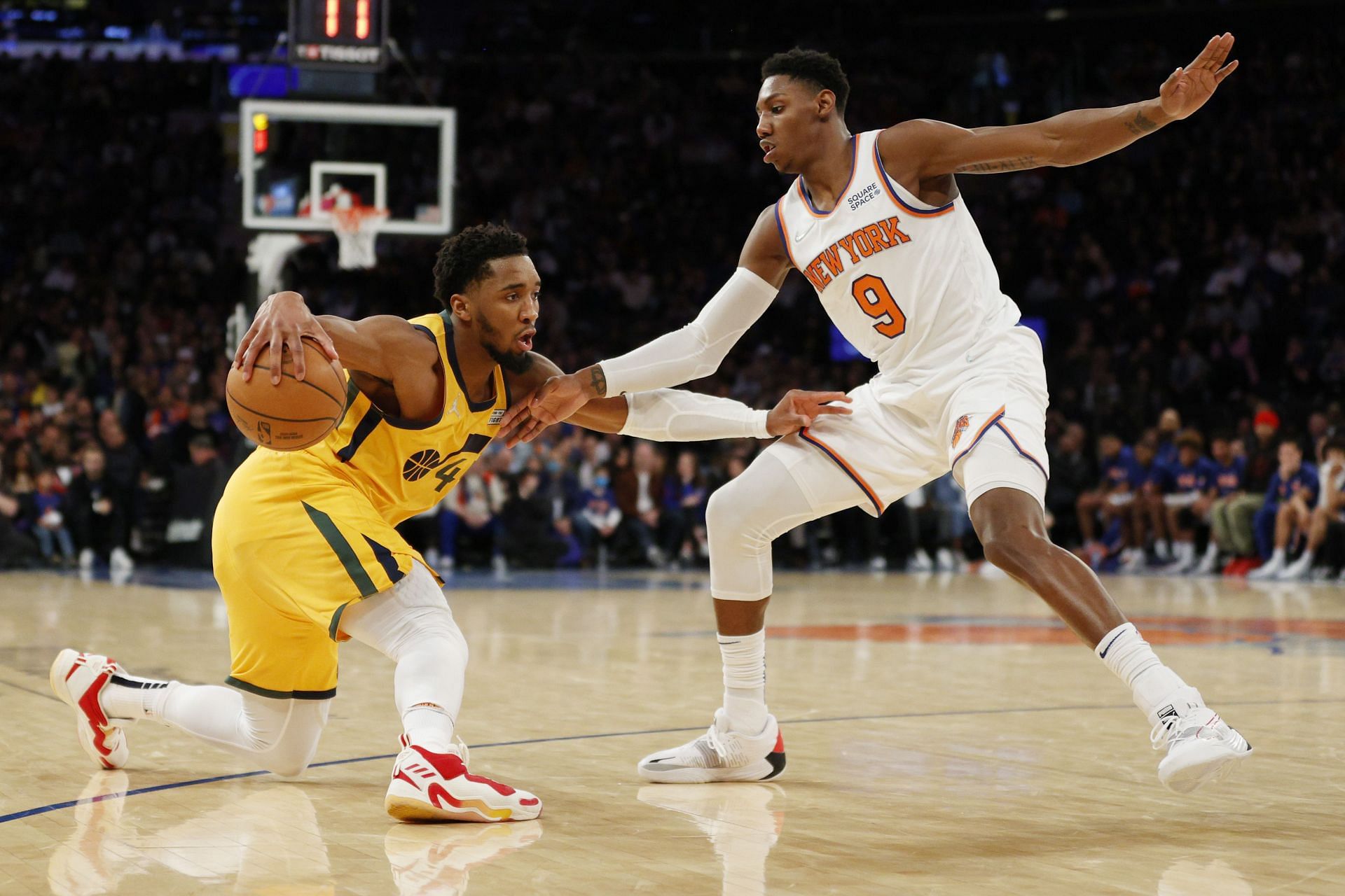 Donovan Mitchell (left) in action for the Utah Jazz against the New York Knicks