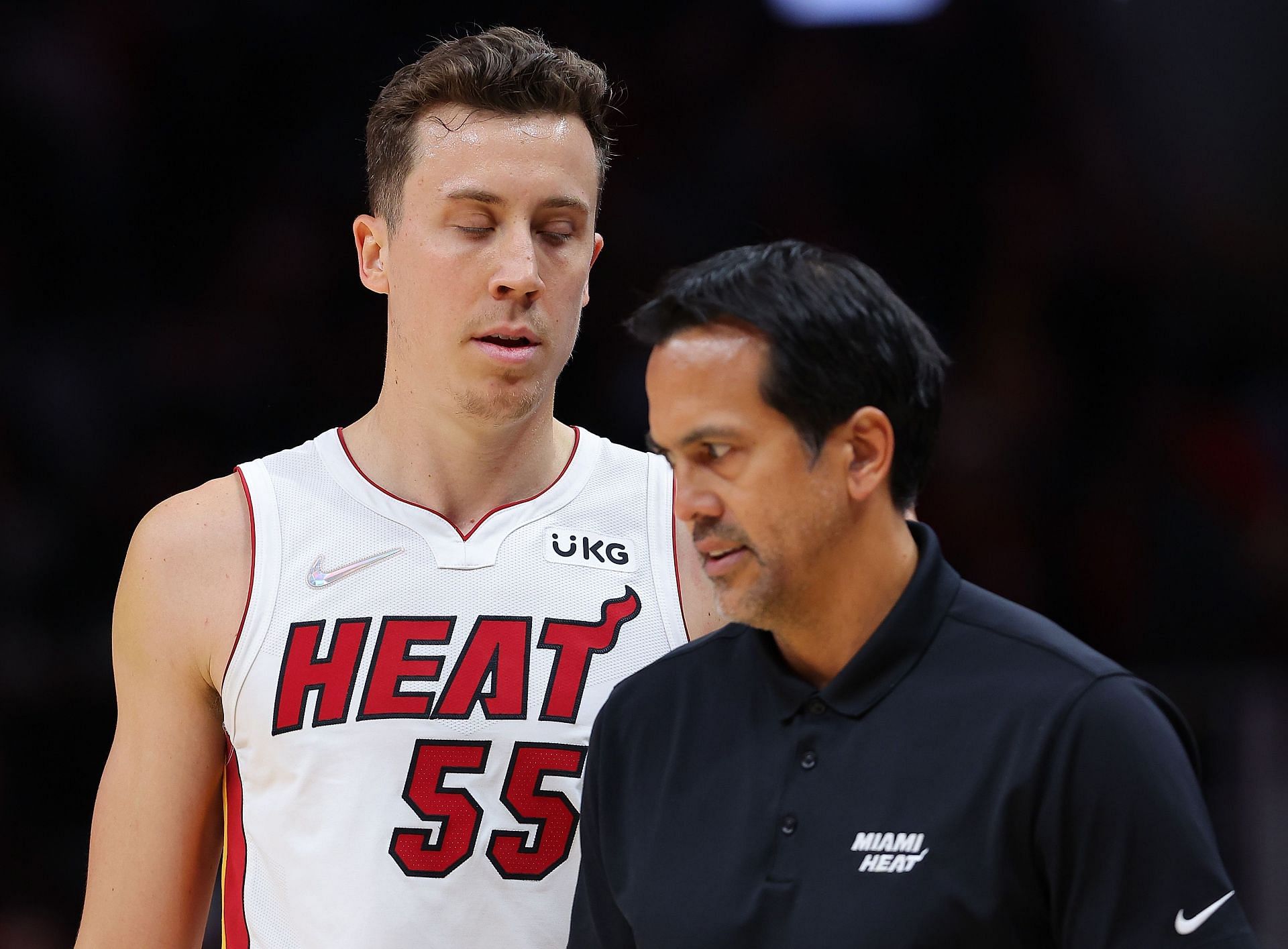 Duncan Robinson #55 and head coach Erik Spoelstra of the Miami Heat