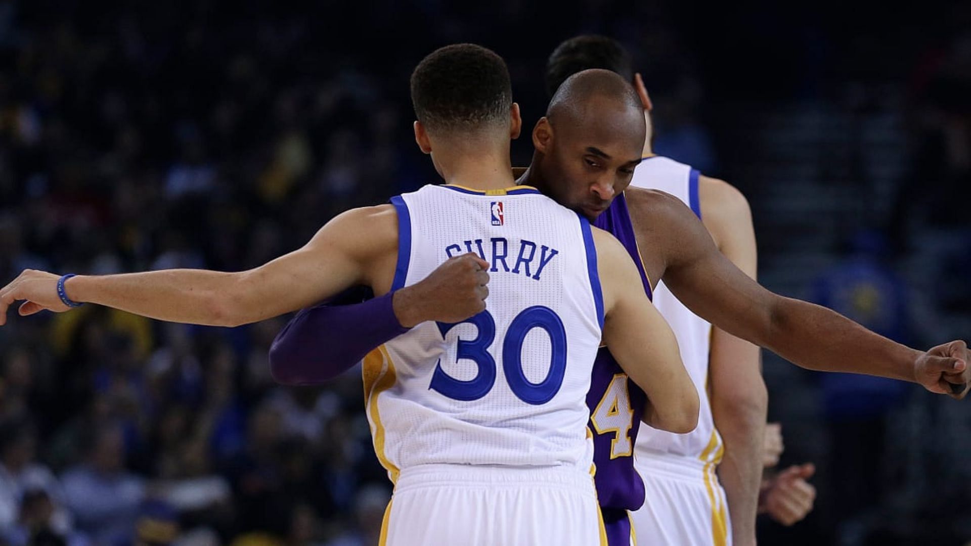 Kobe Bryant and Steph Curry after a game