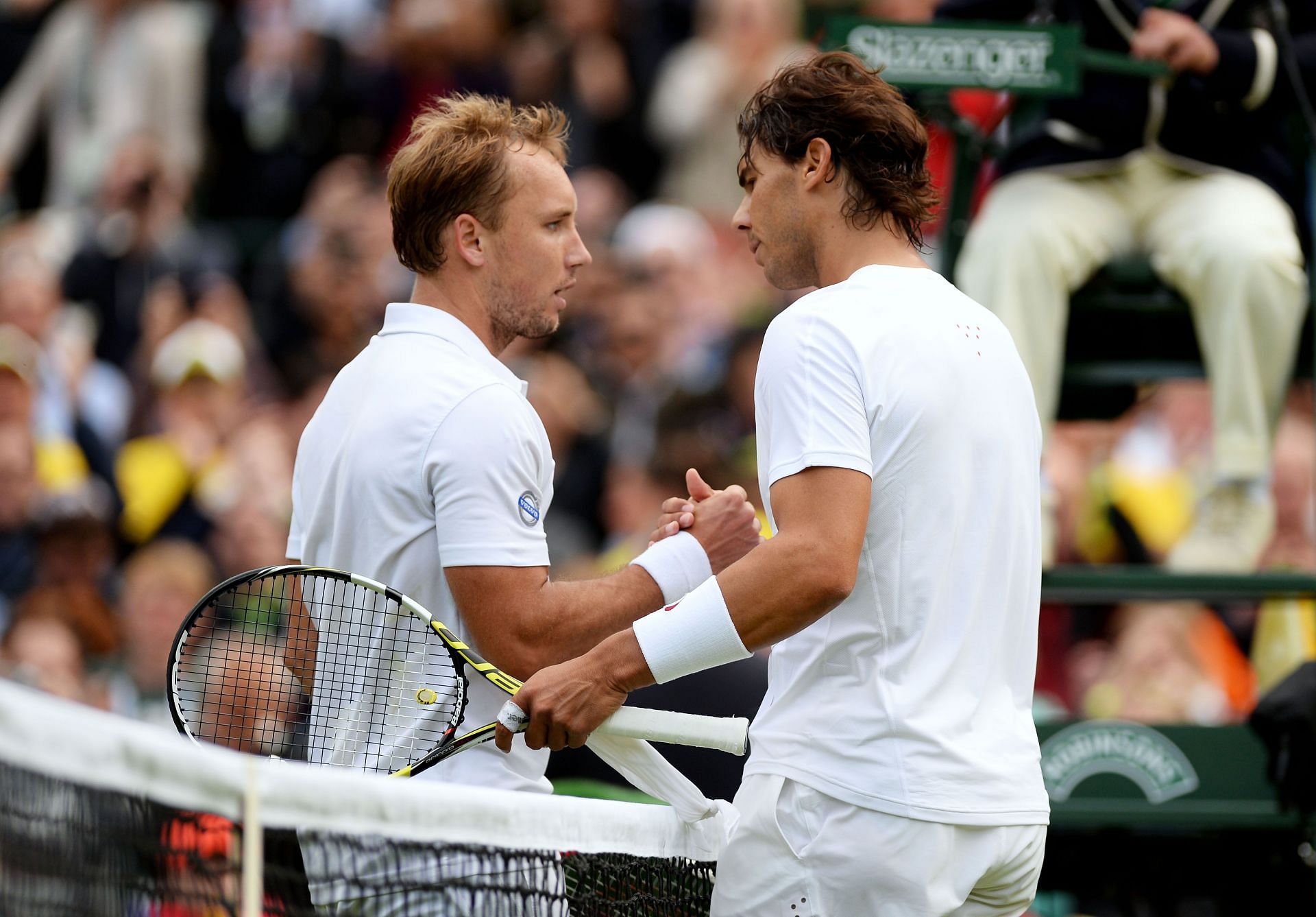Rafael Nadal and Steve Darcis at the net of the Championships - 2013