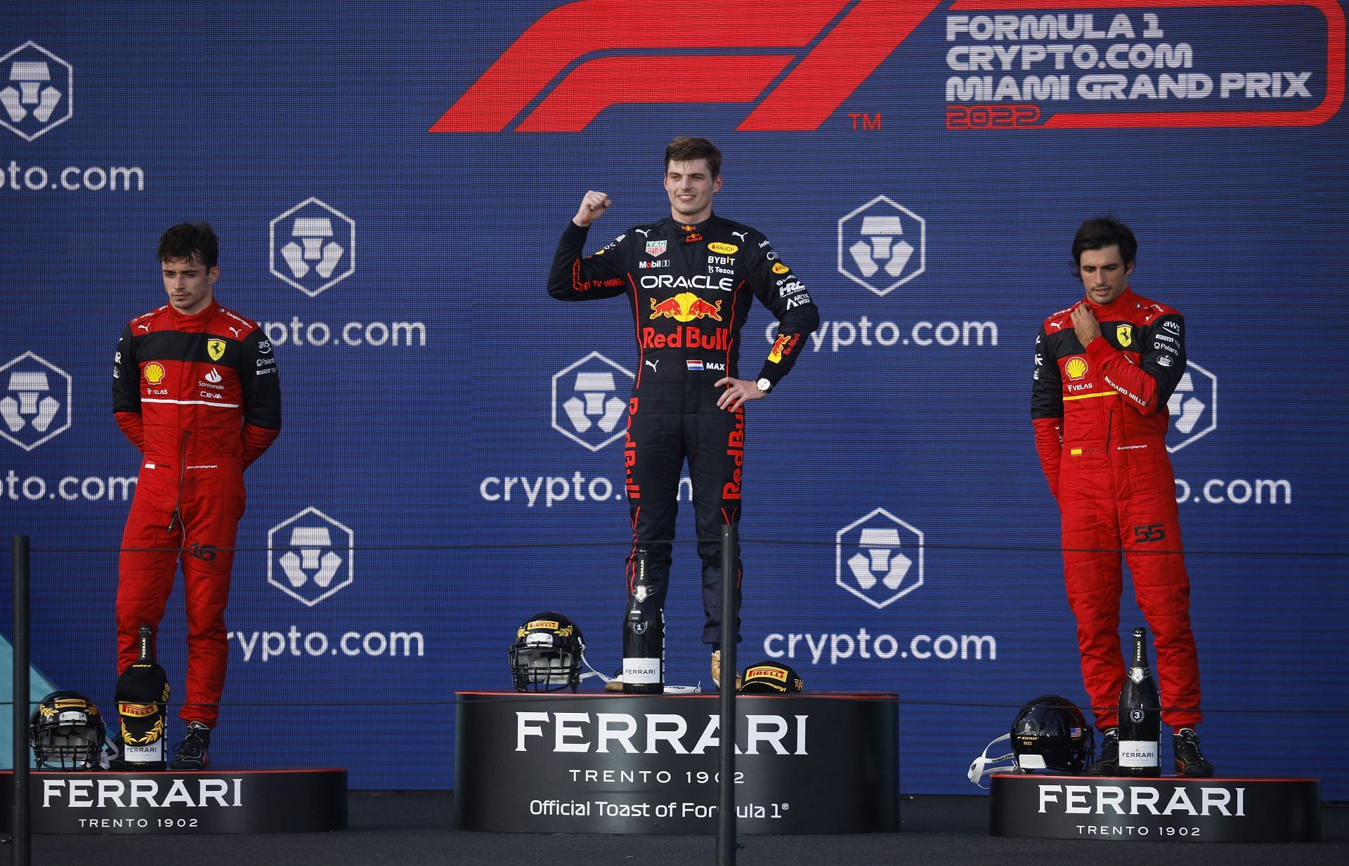Race winner Max Verstappen (center), second-placed Charles Leclerc (left), and third-placed Carlos Sainz (right) celebrate on the podium during the F1 Grand Prix of Miami at the Miami International Autodrome on May 08, 2022, in Miami, Florida (Photo by Chris Graythen/Getty Images)