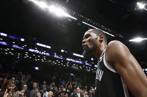 Kevin Durant walks off the court after a win