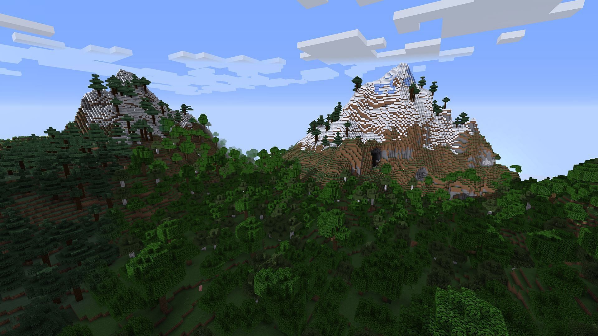 A forest under a mountain, where players can get huge amounts of wood (Image via Minecraft)