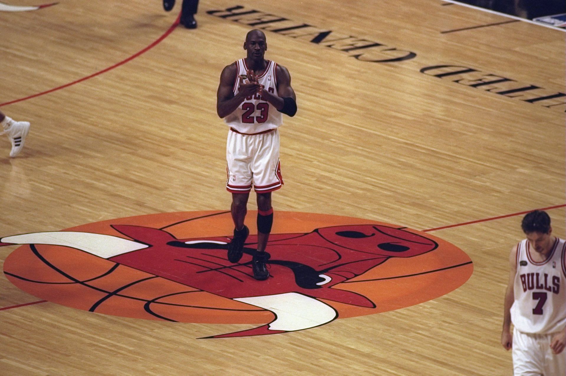 Michael Jordan of the Chicago Bulls walks on the court during the 1998 NBA Finals Game 3 against the Utah Jazz