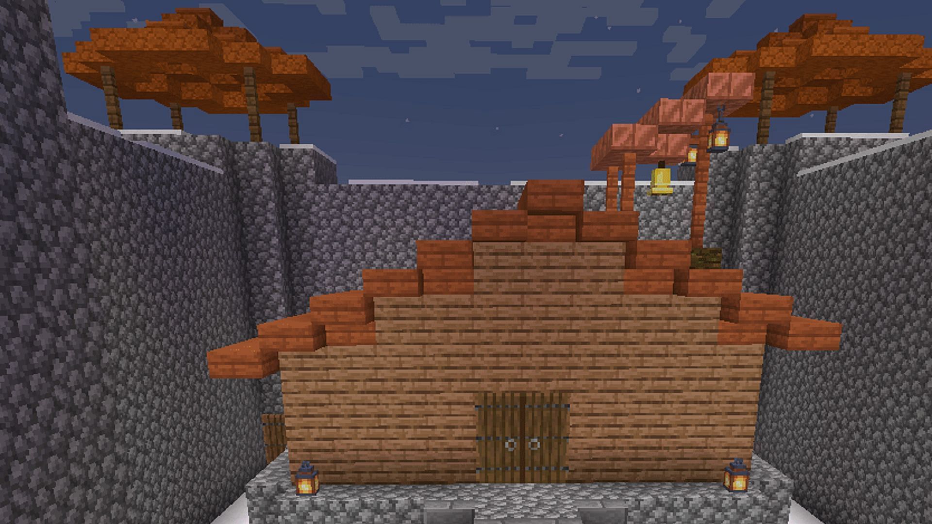 This jungle house incorporates a fair amount of stonework (Image via u/Proofviris642/Reddit)