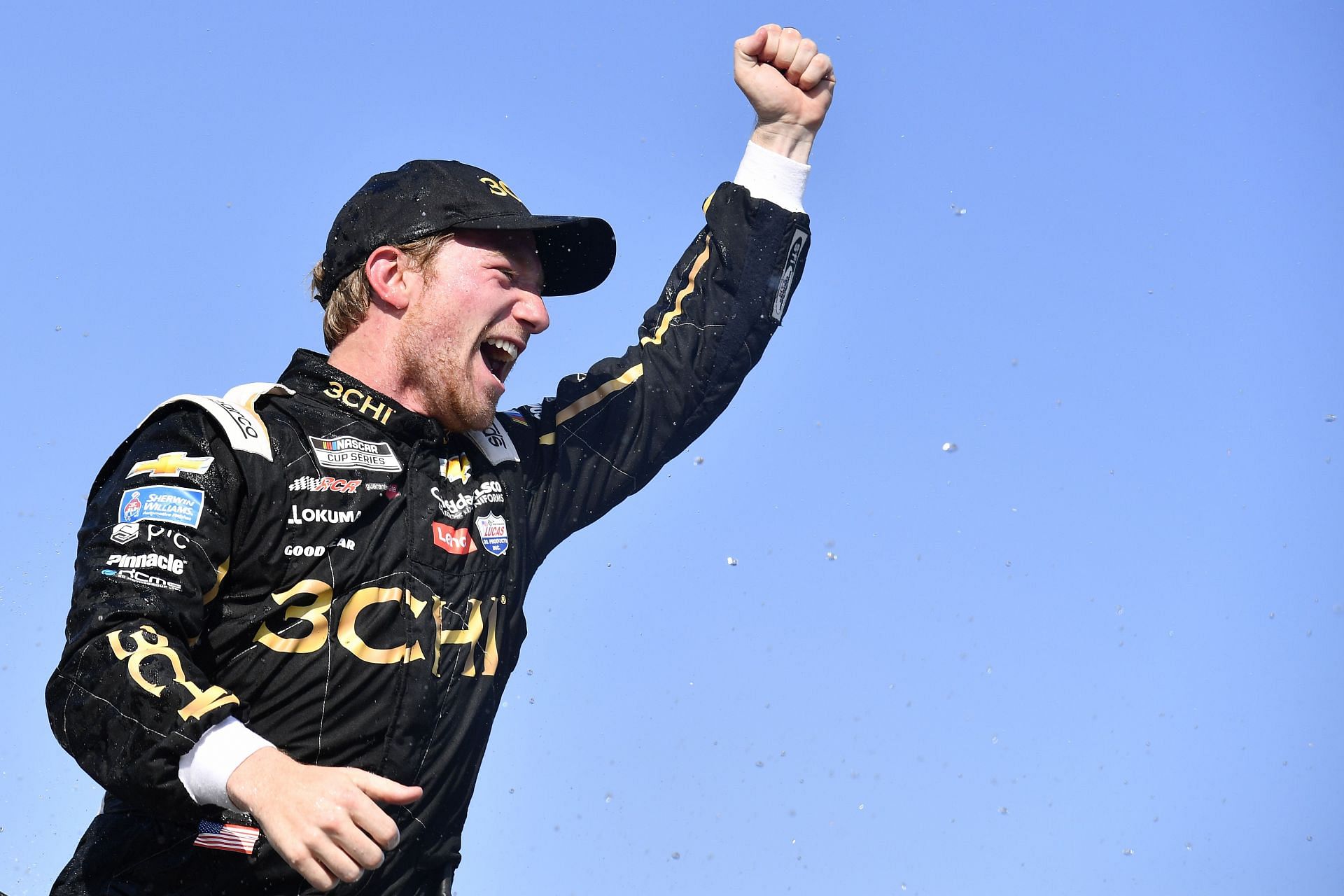 Tyler Reddick celebrates in victory lane after winning the NASCAR Cup Series Kwik Trip 250 at Road America