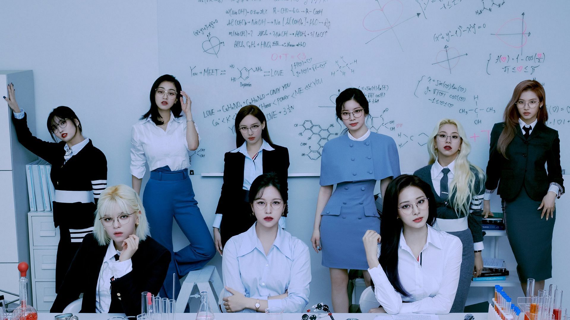 TWICE members pose for the concept photo of Formula Of Love (Image via JYP Entertainment)