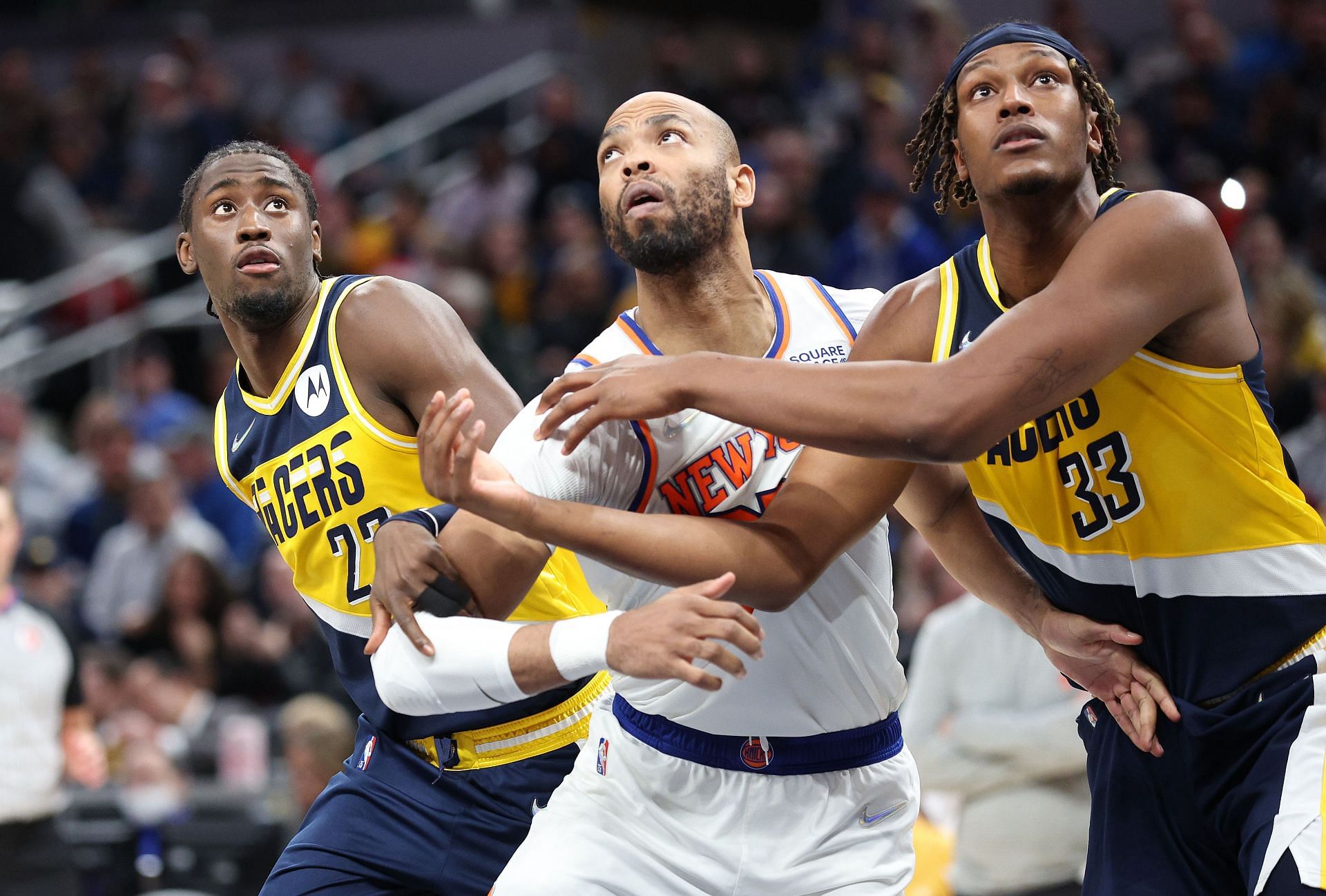 Taj Gibson battles for a rebound