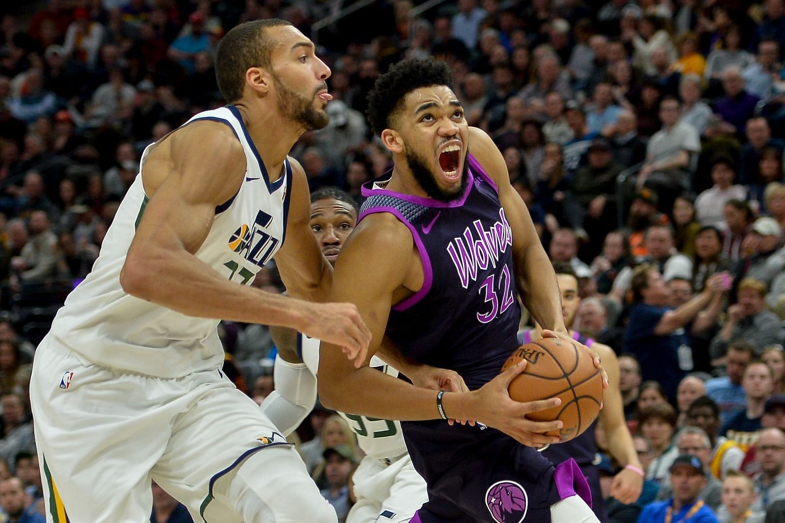 Karl-Anthony Towns of the Minnesota Timberwolves against Rudy Gobert of the Utah Jazz