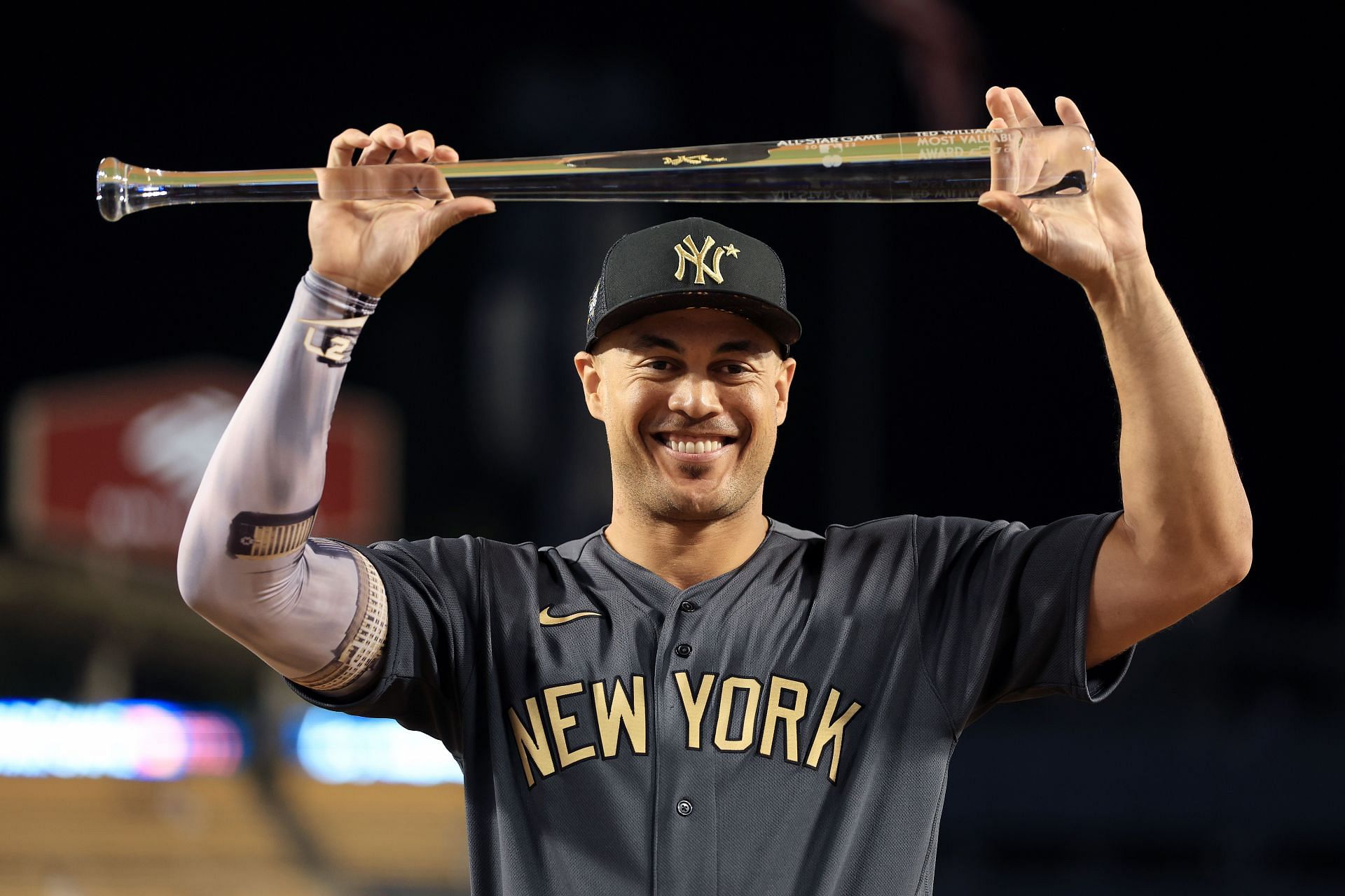 Giancarlo Stanton New York Yankees Unsigned Poses with the Ted Williams MVP  Award in the 2022 MLB All-Star Game Photograph