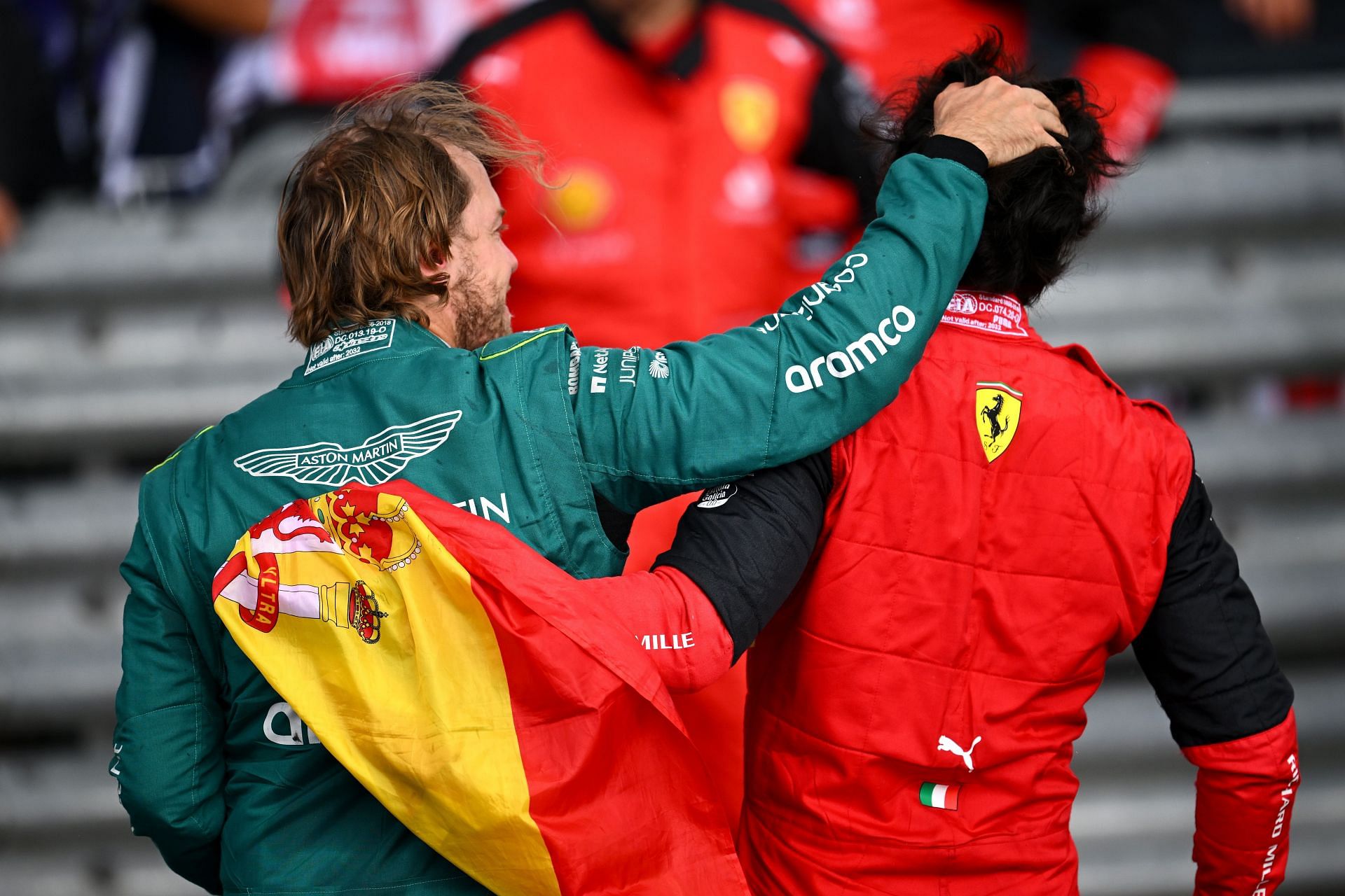 Sebastian Vettel congratulates Race winner Carlos Sainz in parc ferme during the F1 Grand Prix of Great Britain at Silverstone in Northampton, England. (Photo by Clive Mason/Getty Images)