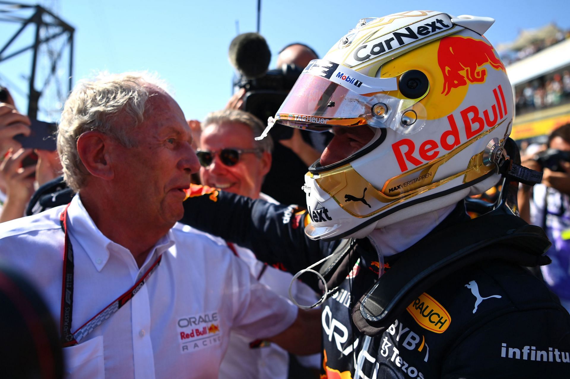Red Bull team advisor Dr. Helmut Marko (left) and Max Verstappen celebrate after the latter win at the 2022 F1 French GP. (Photo by Dan Mullan/Getty Images)