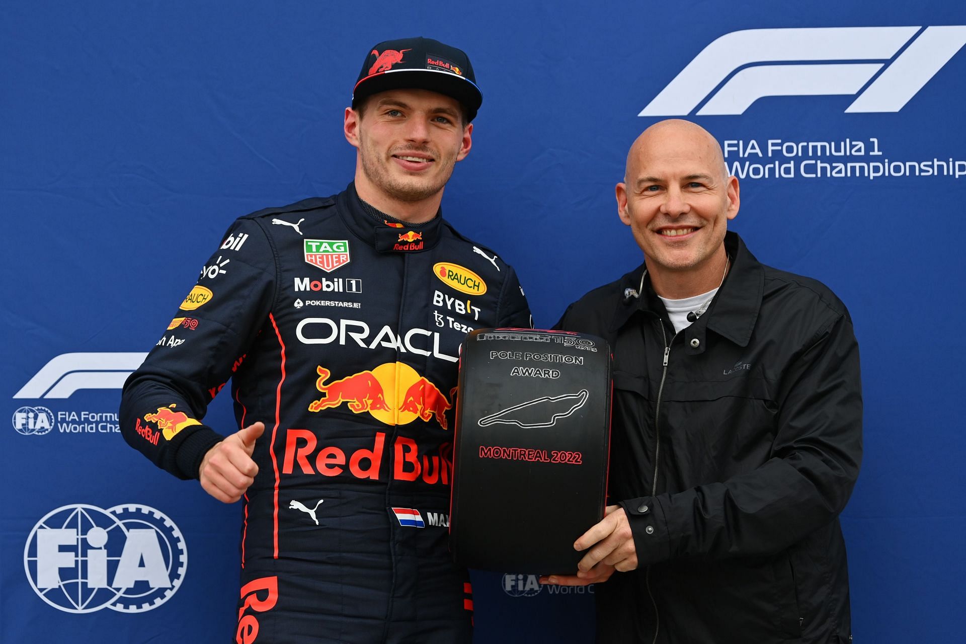 Red Bull driver Max Verstappen (left) and 1997 F1 world champion Jacques Villeneuve photographed during the 2022 F1 Canadian GP weekend (Photo by Dan Mullan/Getty Images)