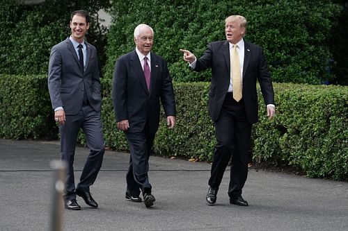 (L-R) Joey Logano, Team Penske owner Roger Penske, and former U.S. President Donald Trump arrive for a ceremony celebrating Logano's victory on the South Lawn of the White House on April 30, 2019. in Washington, DC (Photo by Chip Somodevilla/Getty Images)