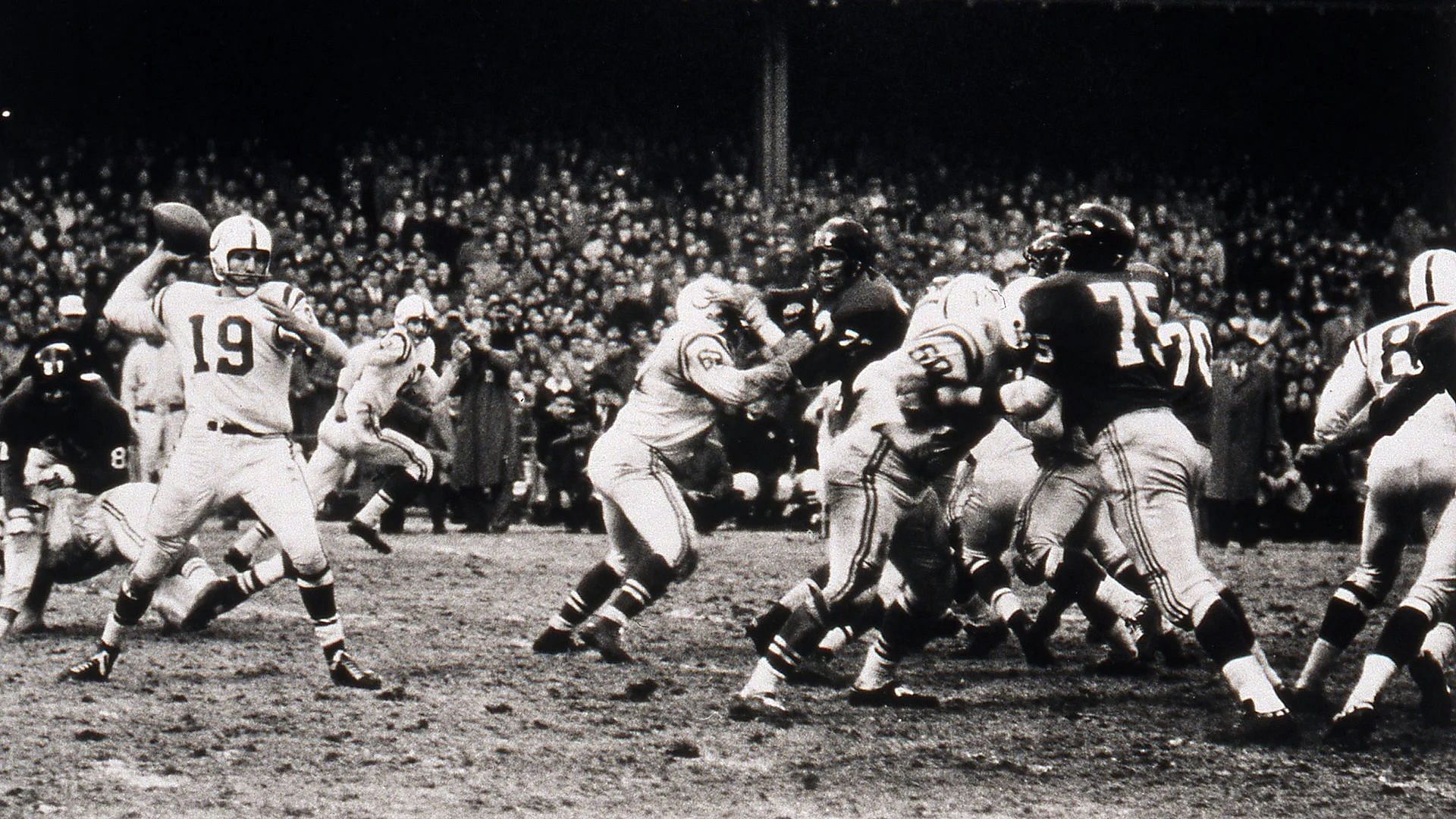New York battles Chicago in the 1956 NFL Championship game. Photo via giants.com