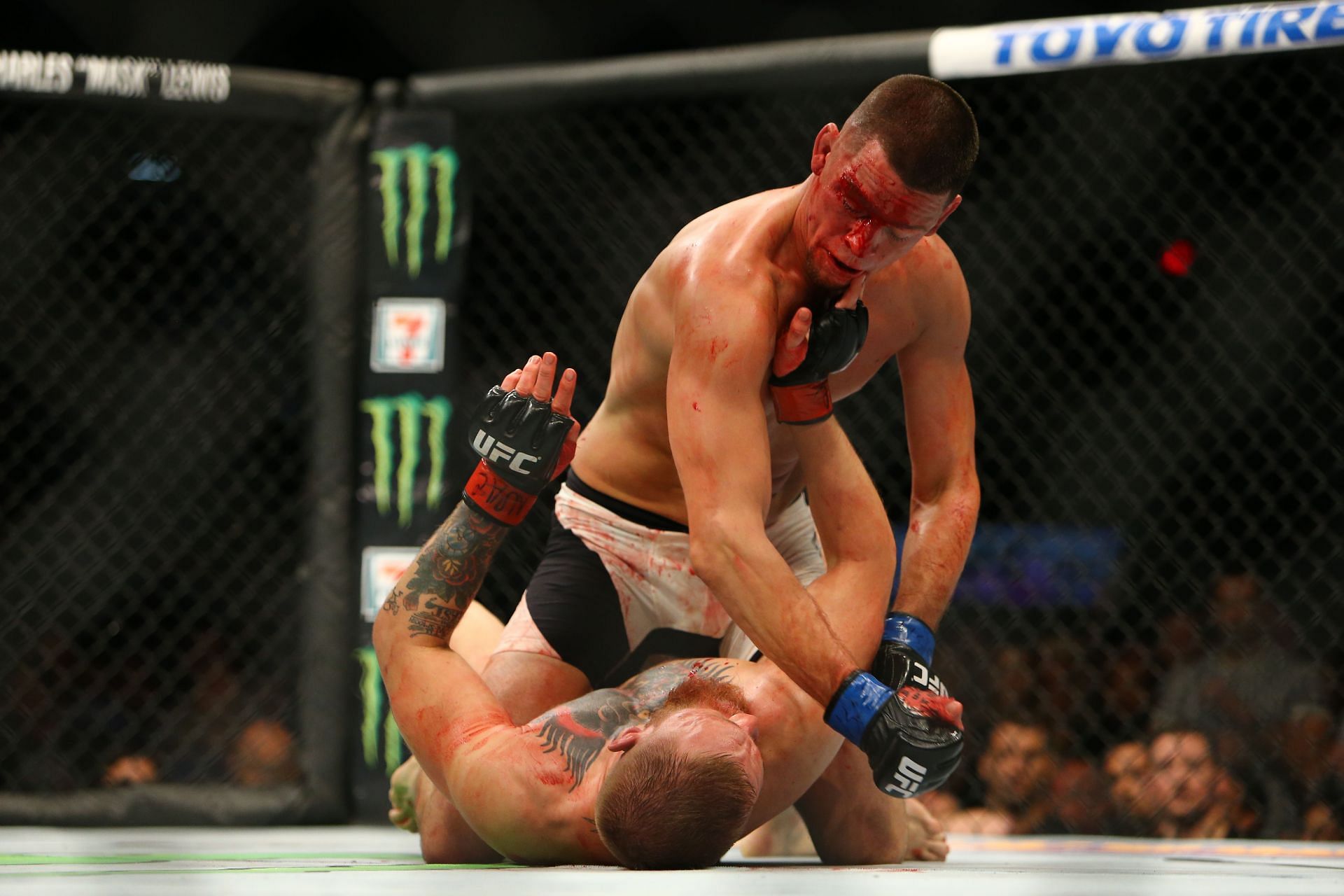 Nate Diaz (top) and Conor McGregor (bottom) at UFC 196