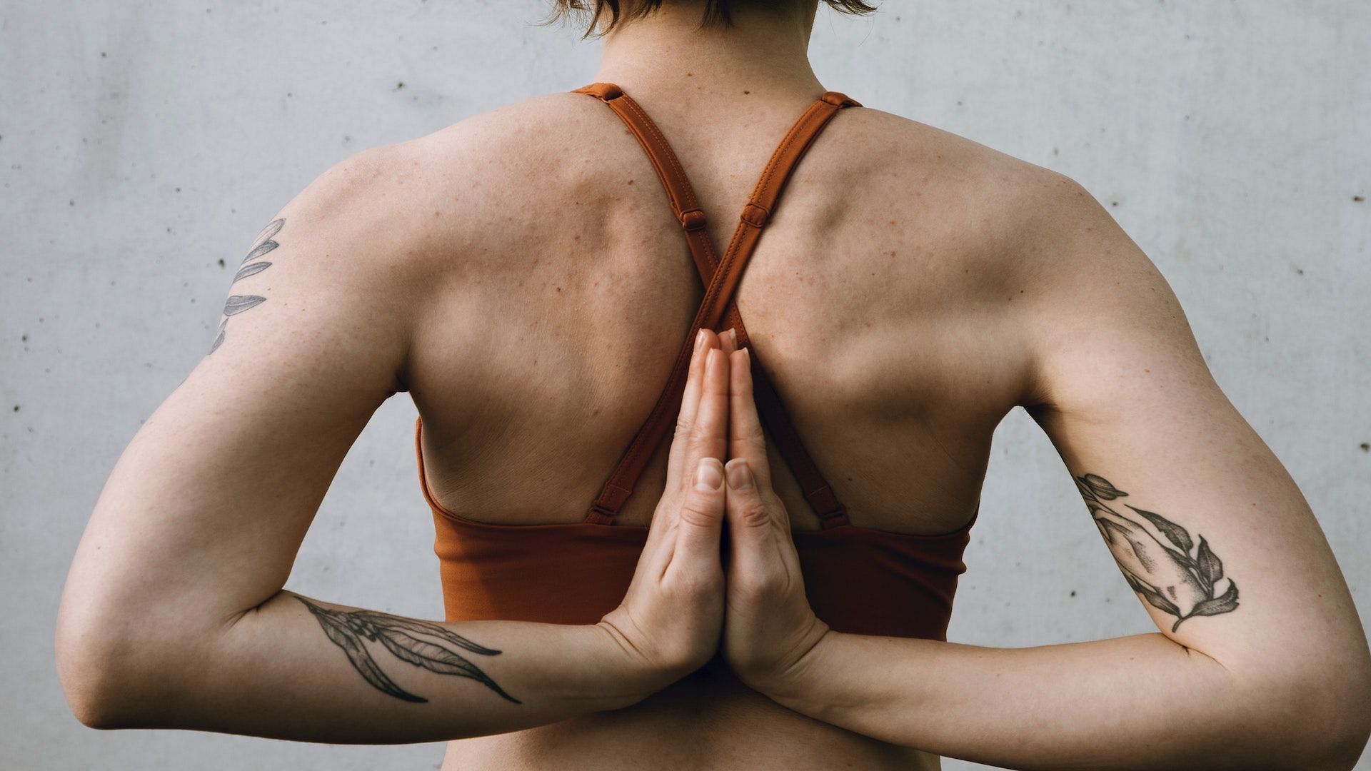 Women must focus on proper posture to overcome pain. Image via Unsplash/Jade Stephens
