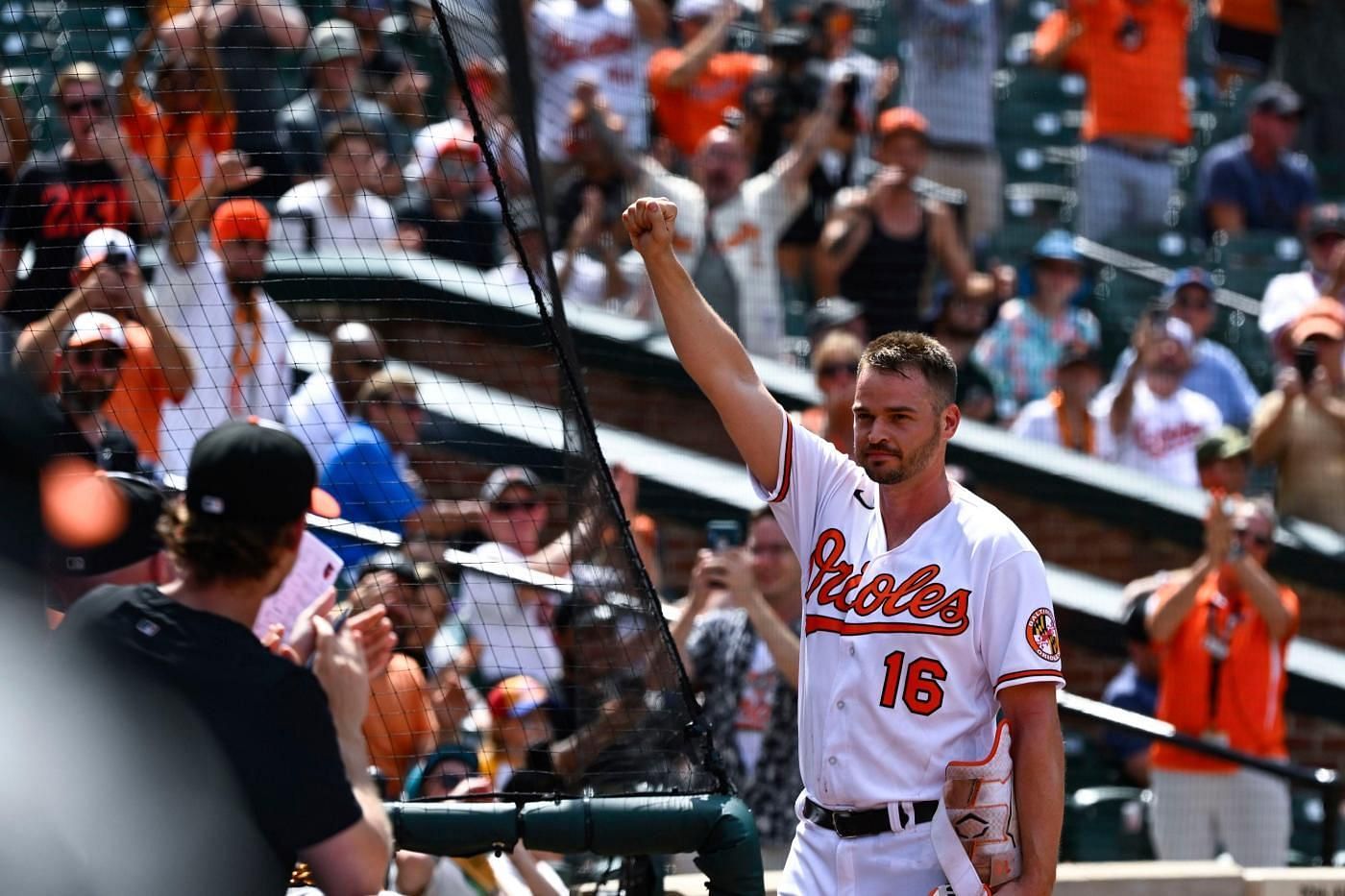 Trey Mancini salutes the Baltimore crowd following his inside-the-park home run against the Tampa Bay Rays.