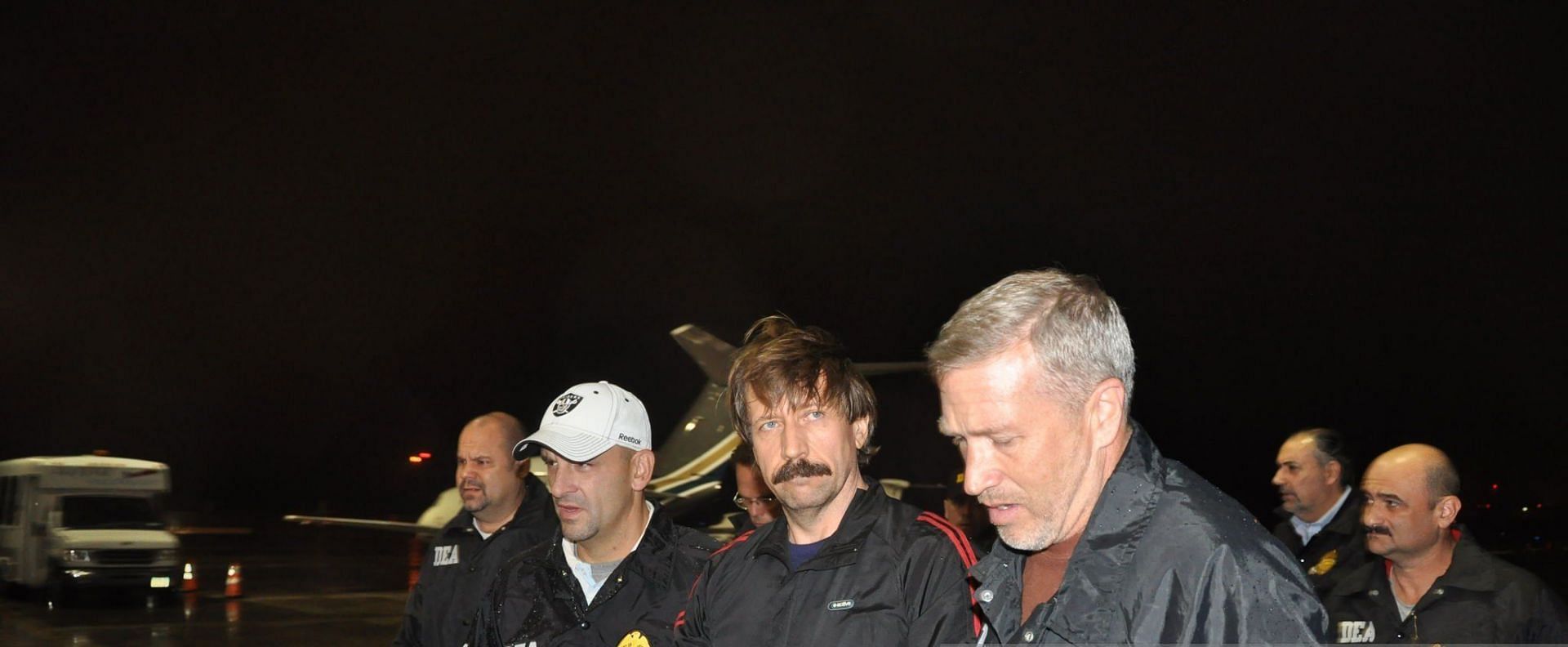 Viktor Bout was arrested in Thailand in 2008 after a sting operation by US officials (Image via U.S. Department of Justice/Getty Images)