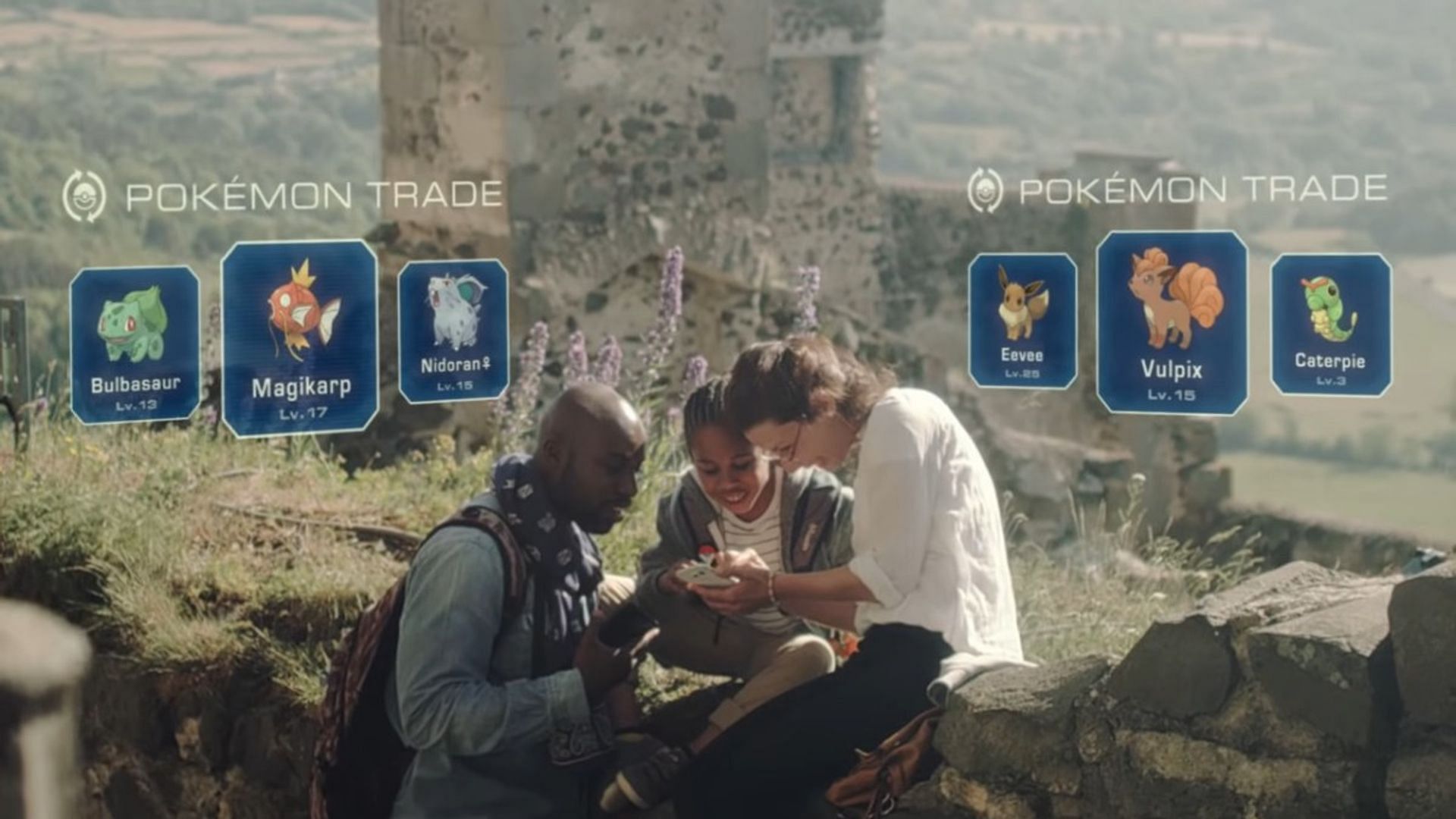 Two players trading Pokemon in Pokemon GO&#039;s reveal trailer (Image via Niantic)