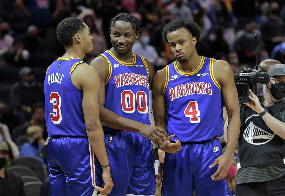 (L-R) Jordan Poole, Jonathan Kuminga, and Moses Moody of the Golden State Warriors last season [Source: SF Chronicle]