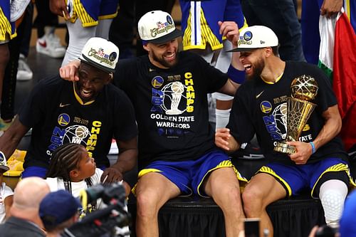 Draymond Green, Klay Thompson and Steph Curry of the Golden State Warriors after the 2022 NBA Finals