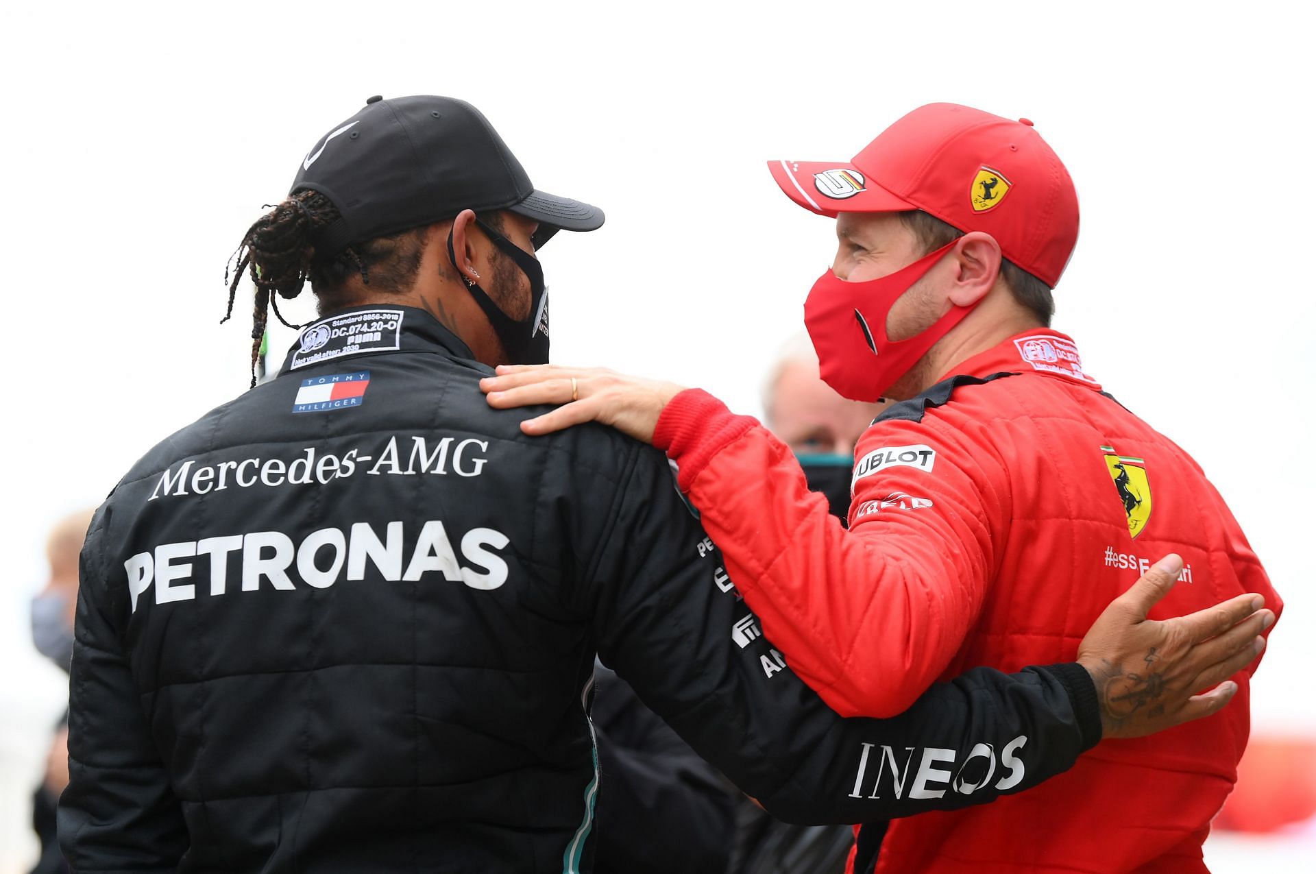 Lewis Hamilton (left) and Sebastian Vettel (right) in parc ferm&eacute; during the 2020 F1 Grand Prix of Turkey at Intercity Istanbul Park in Turkey, after the Briton claimed his seventh title (Photo by Clive Mason/Getty Images)