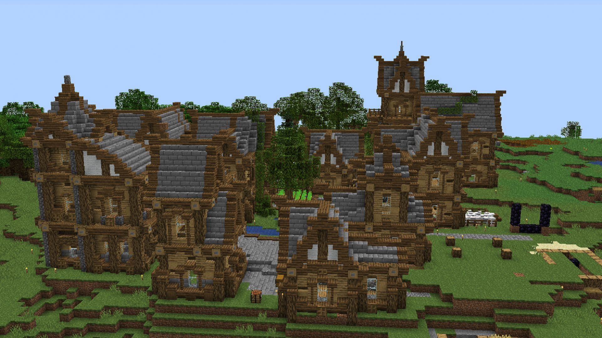A player-made Minecraft town (Image via u/[deleted]/Reddit)