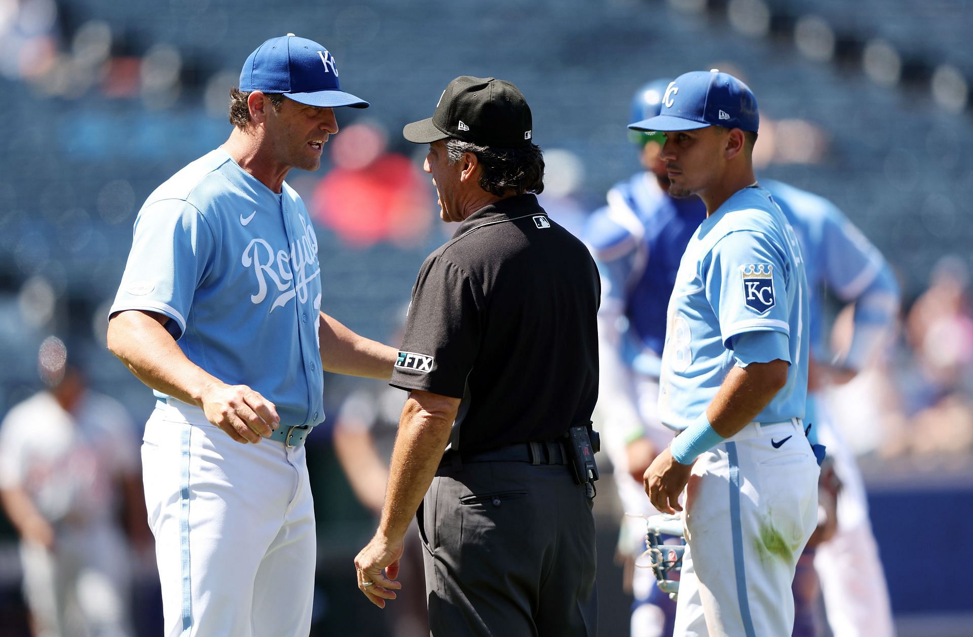 Manager Mike Matheny of the Kansas City Royals argues with umpire Phil Cuzzi during the game